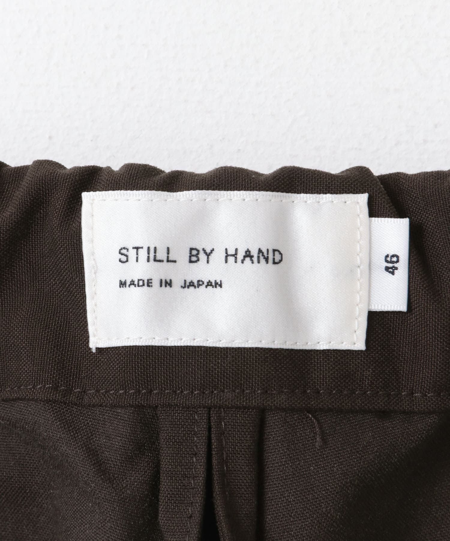 STILL BY HAND ナイロンタスランテーパードタックパンツ[DMA4