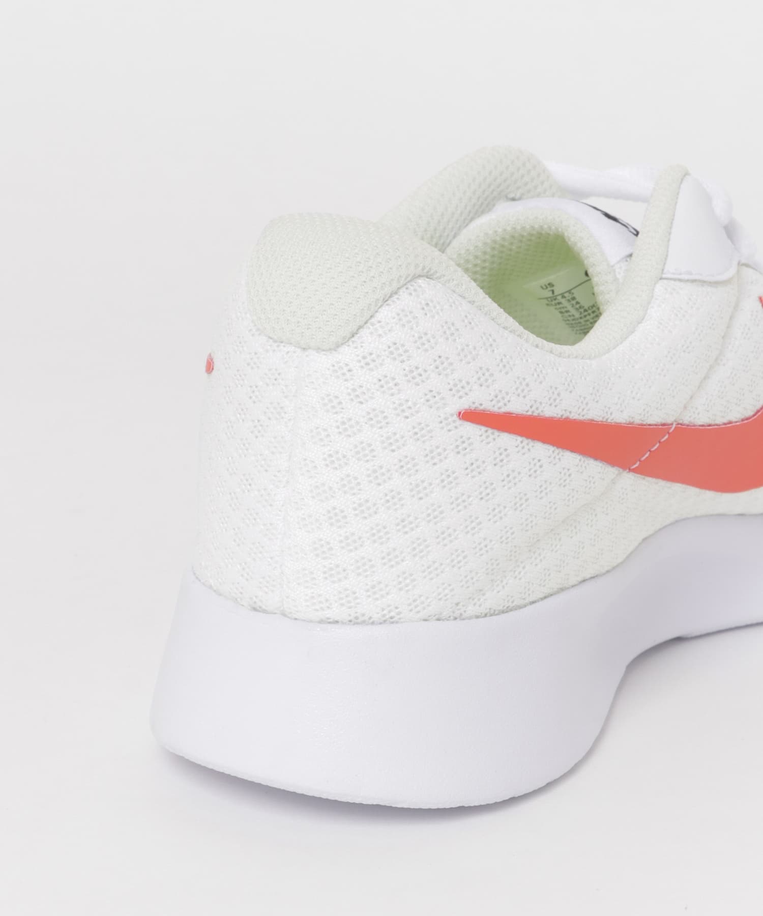 Nike tanjun tennis shoes sales