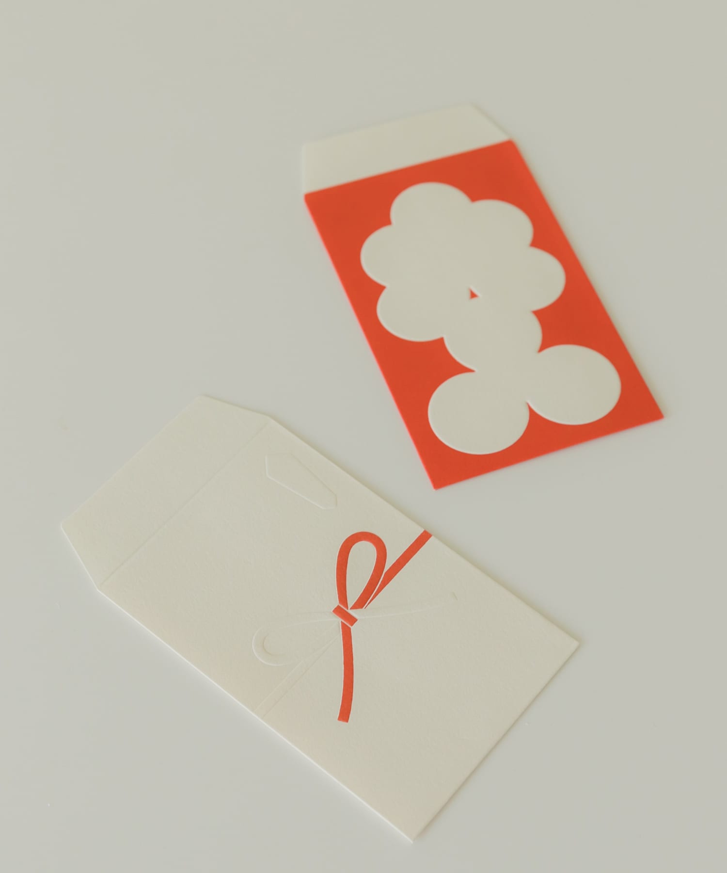 大成紙器製作所　EMBOSS POCHI 花結び -
