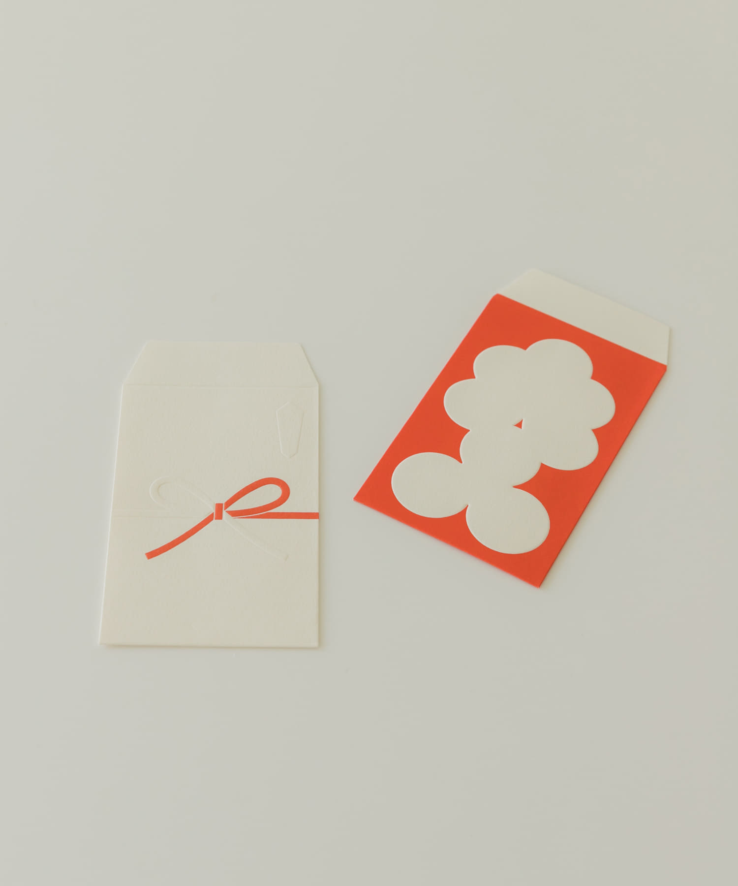大成紙器製作所　EMBOSS POCHI 花結び -