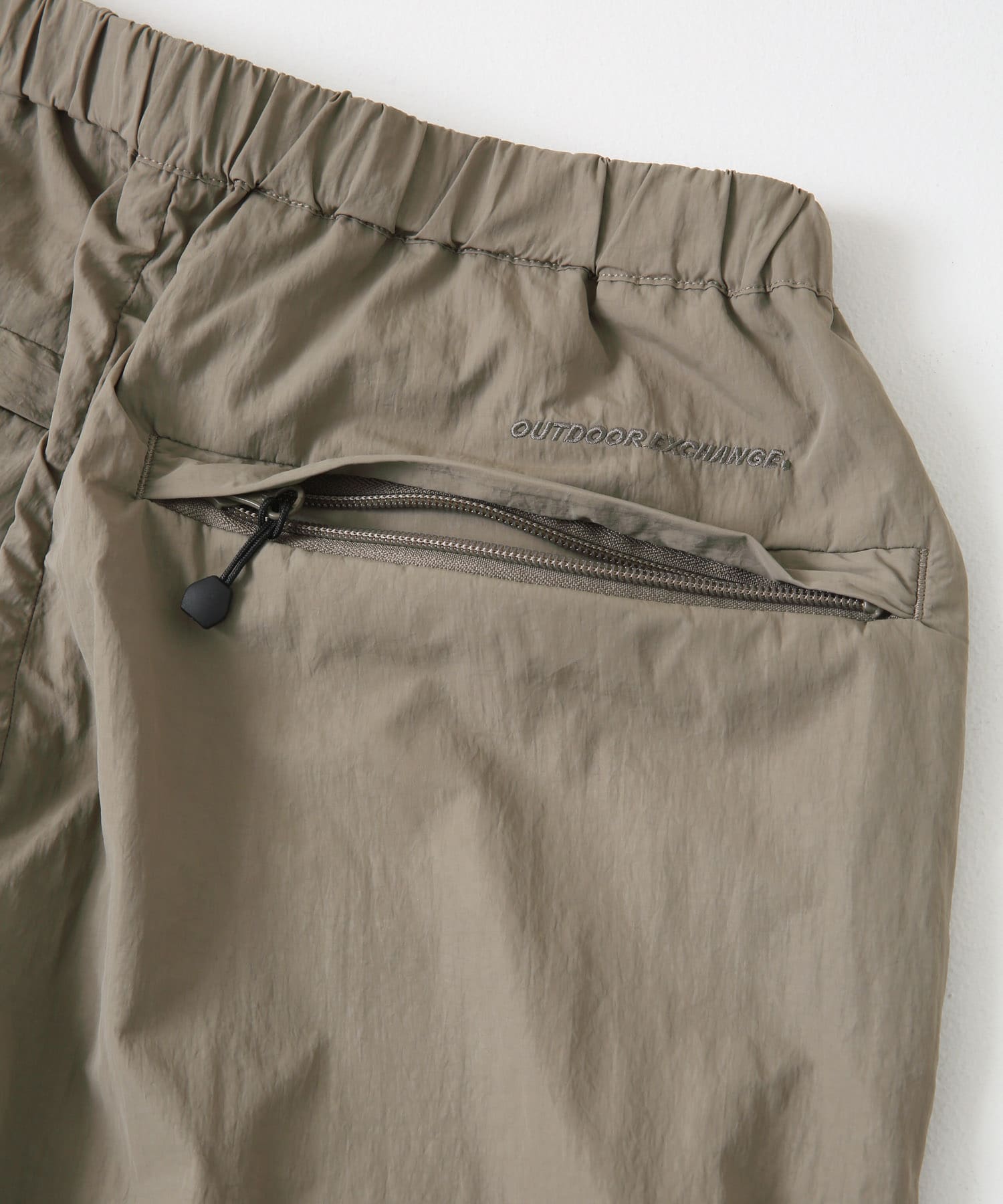 OUTDOOR EXCHANGE ナイロンパンツ SAND M
