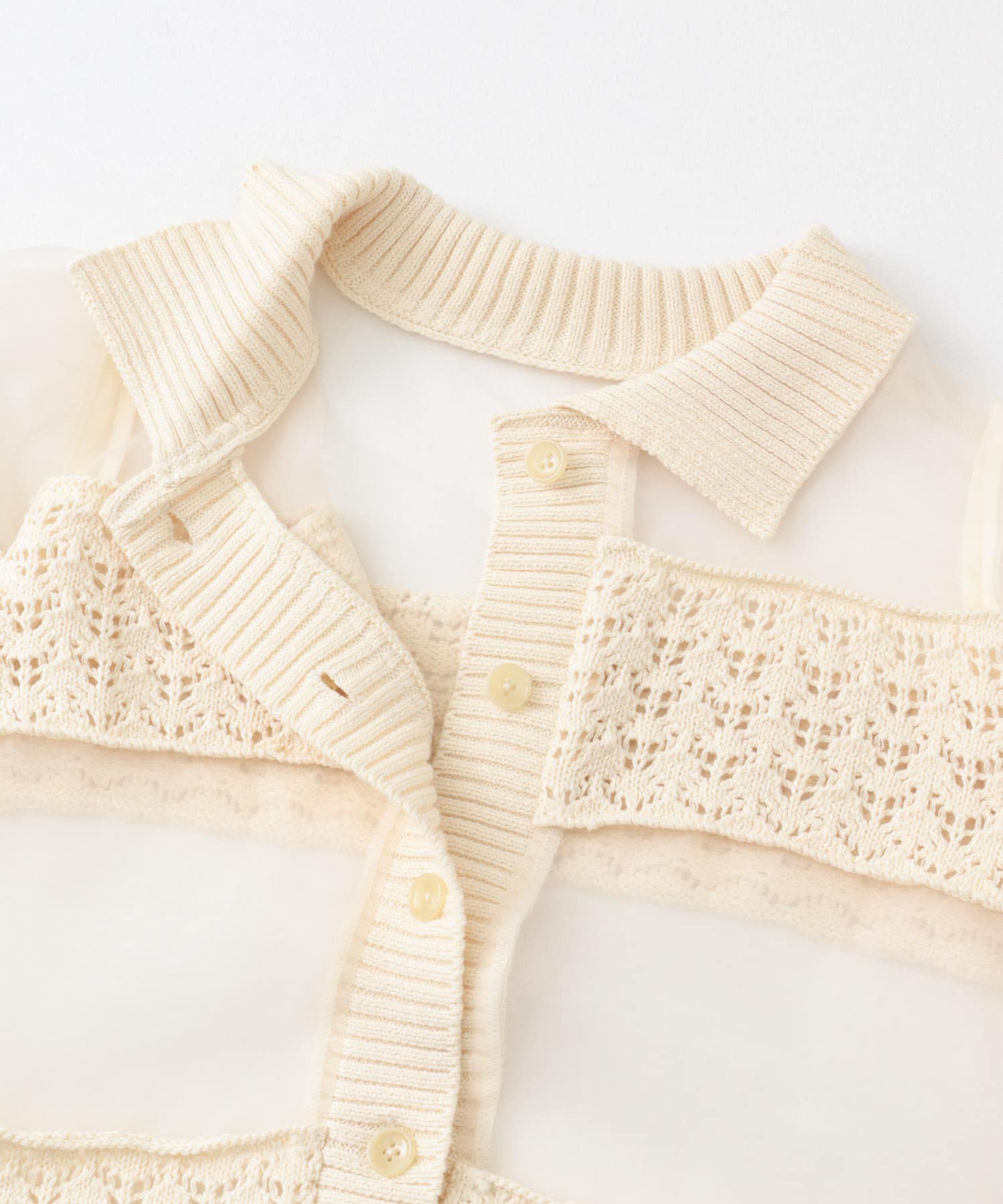 クロシェニットドッキングブラウス IVORY one