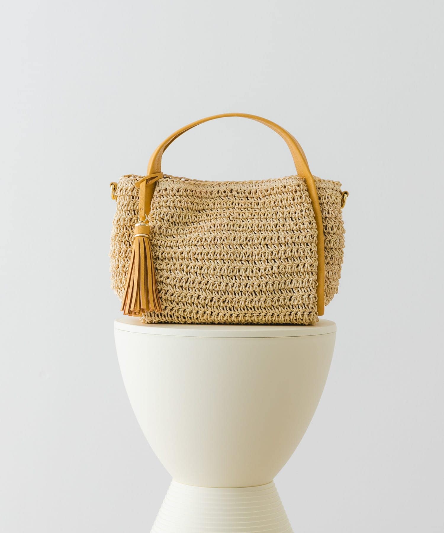 タッセル付ペーパーミニバッグ CAMEL one