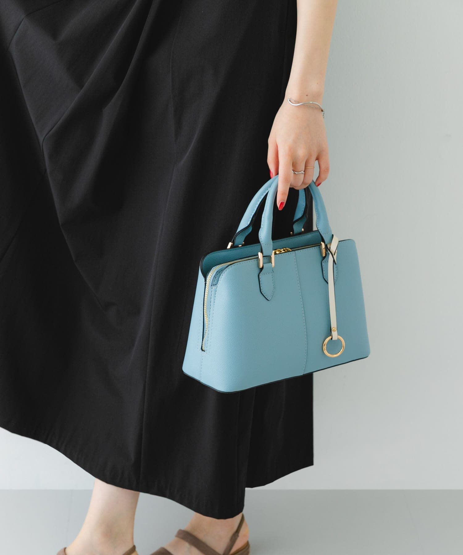 センターステッチハンドバッグ SAX one