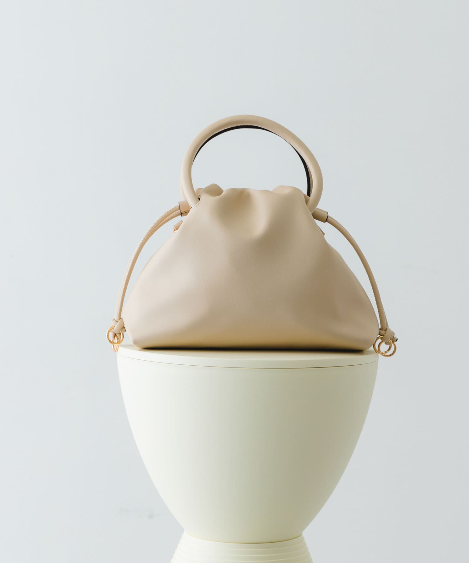 サークルハンドルドロストバッグ