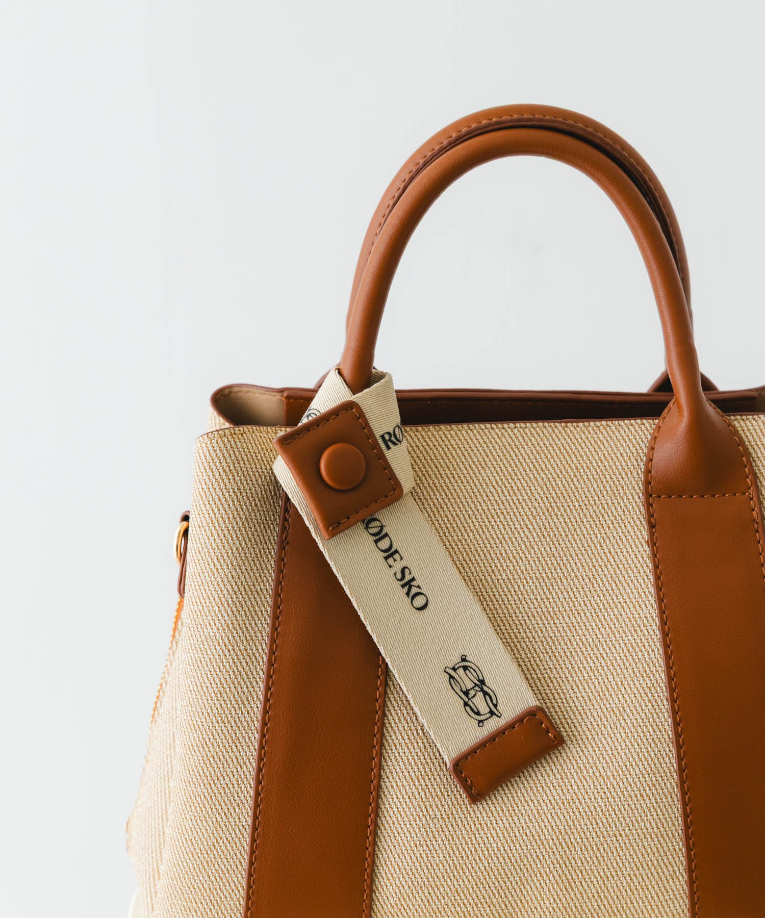 ロゴリボン付2WAYハンドバッグ OFFxCML one