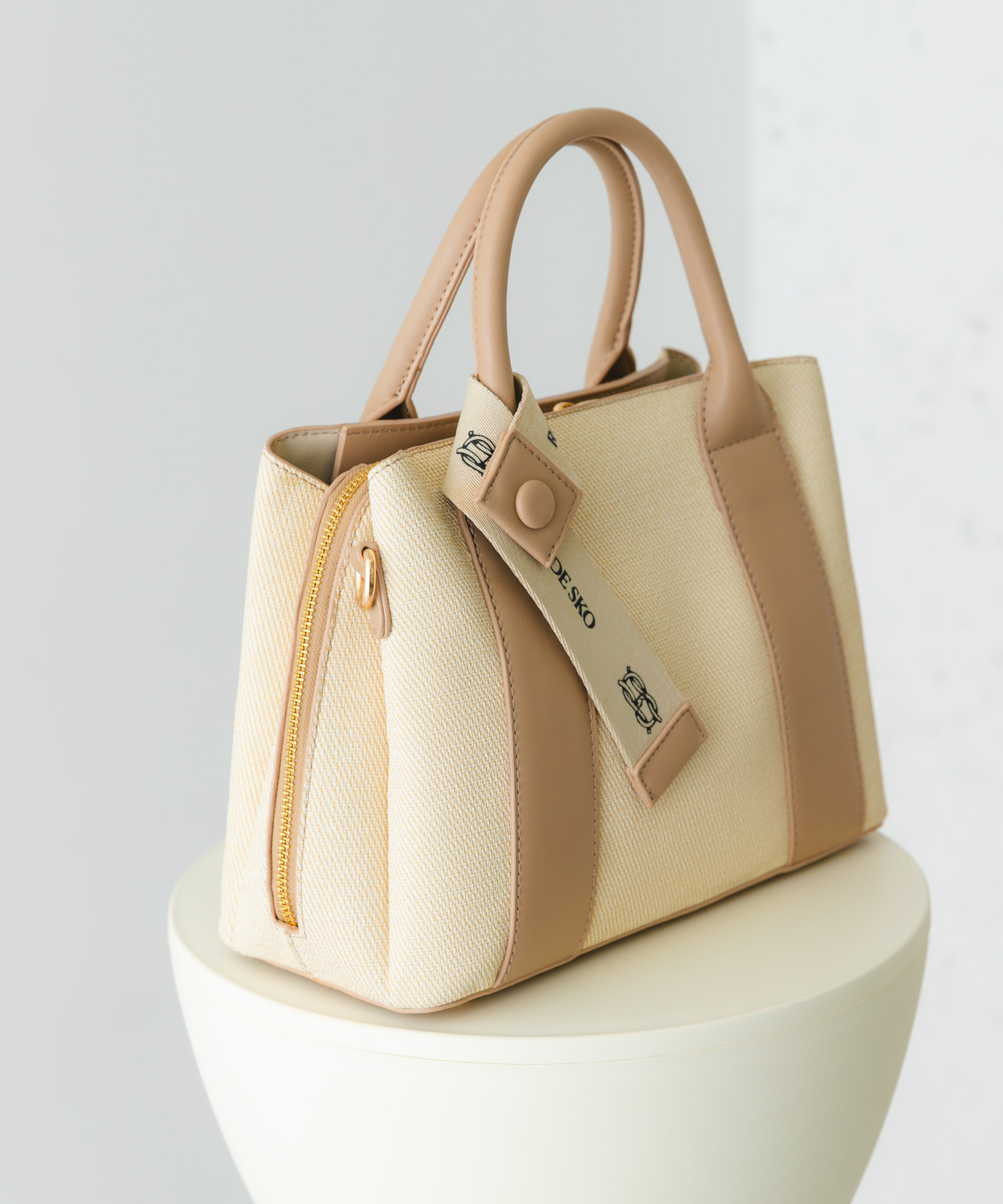 ロゴリボン付2WAYハンドバッグ IVORYxBEG one