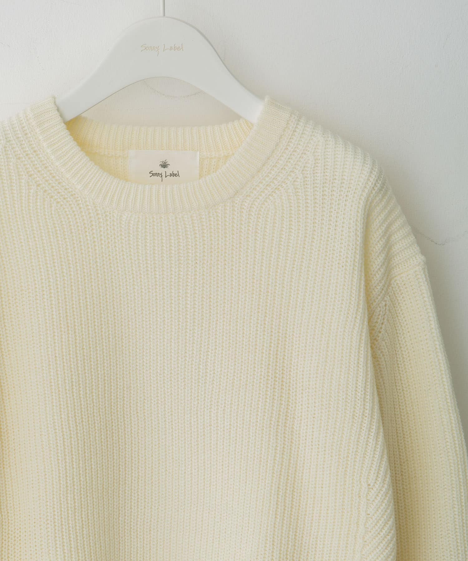 ウォッシャブルウール混クルーネックニット オフ M