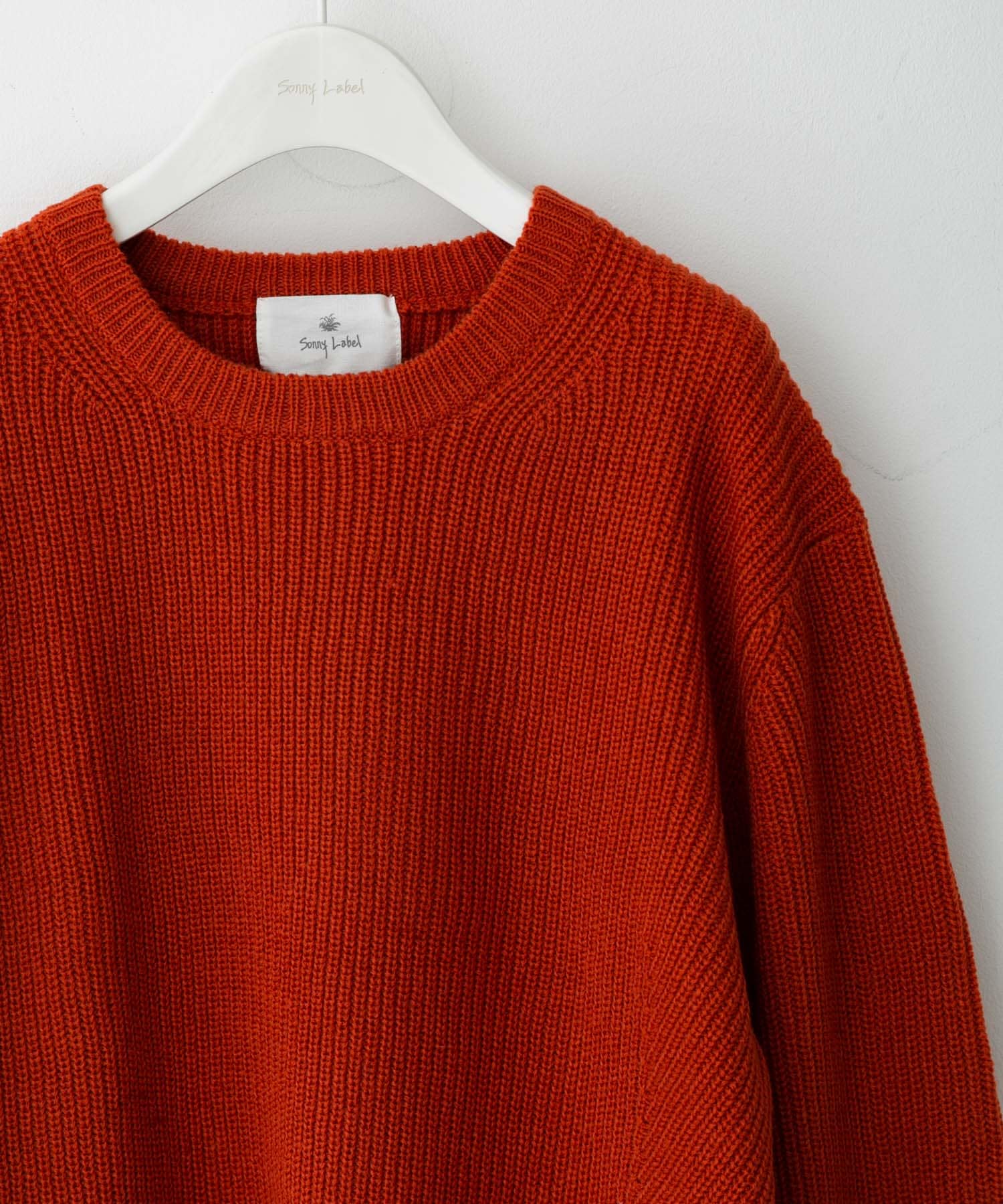 ウォッシャブルウール混クルーネックニット オレンジ M