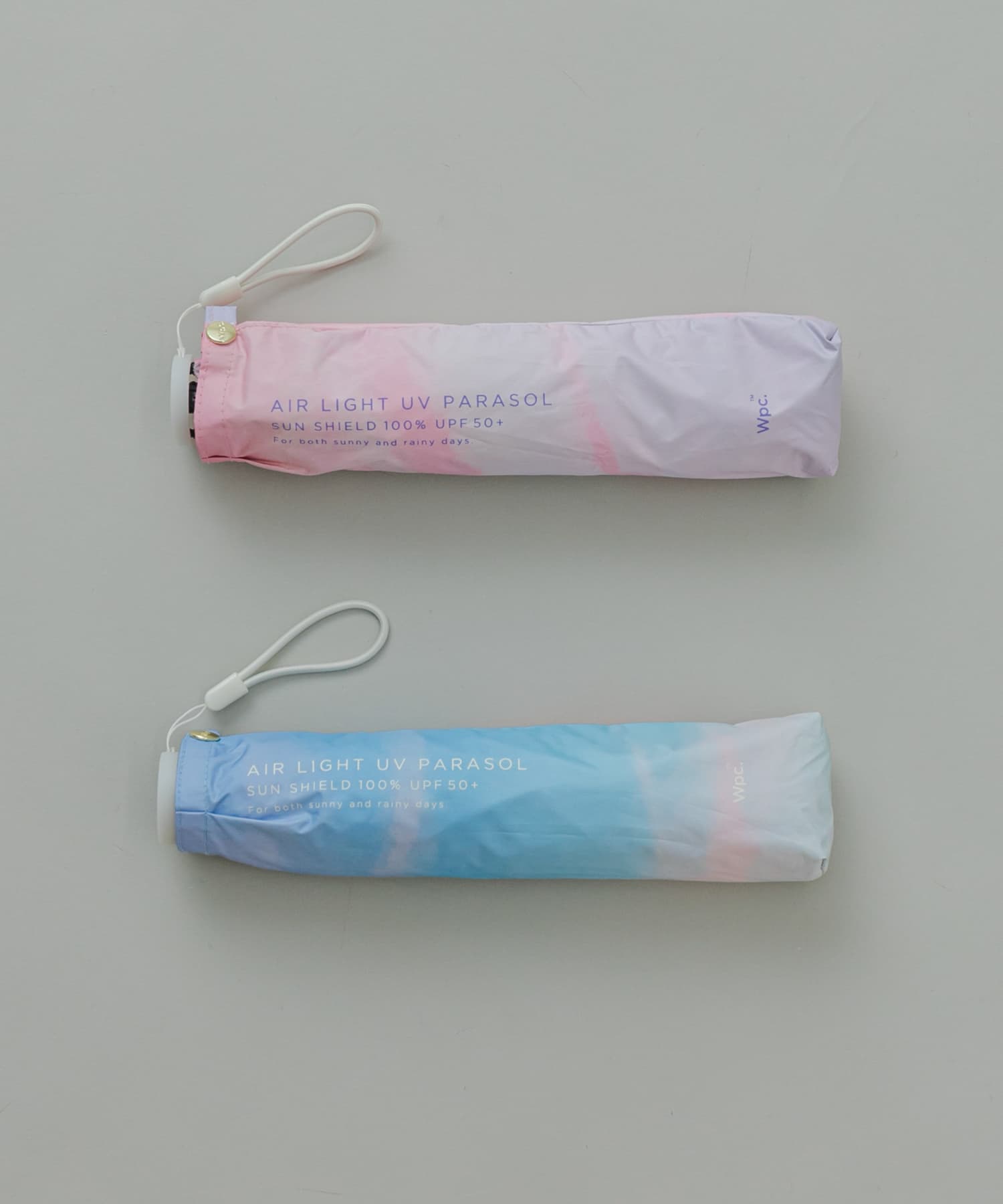 【晴雨兼用】Wpc.　遮光軽量サンセットMINI BLU FREE