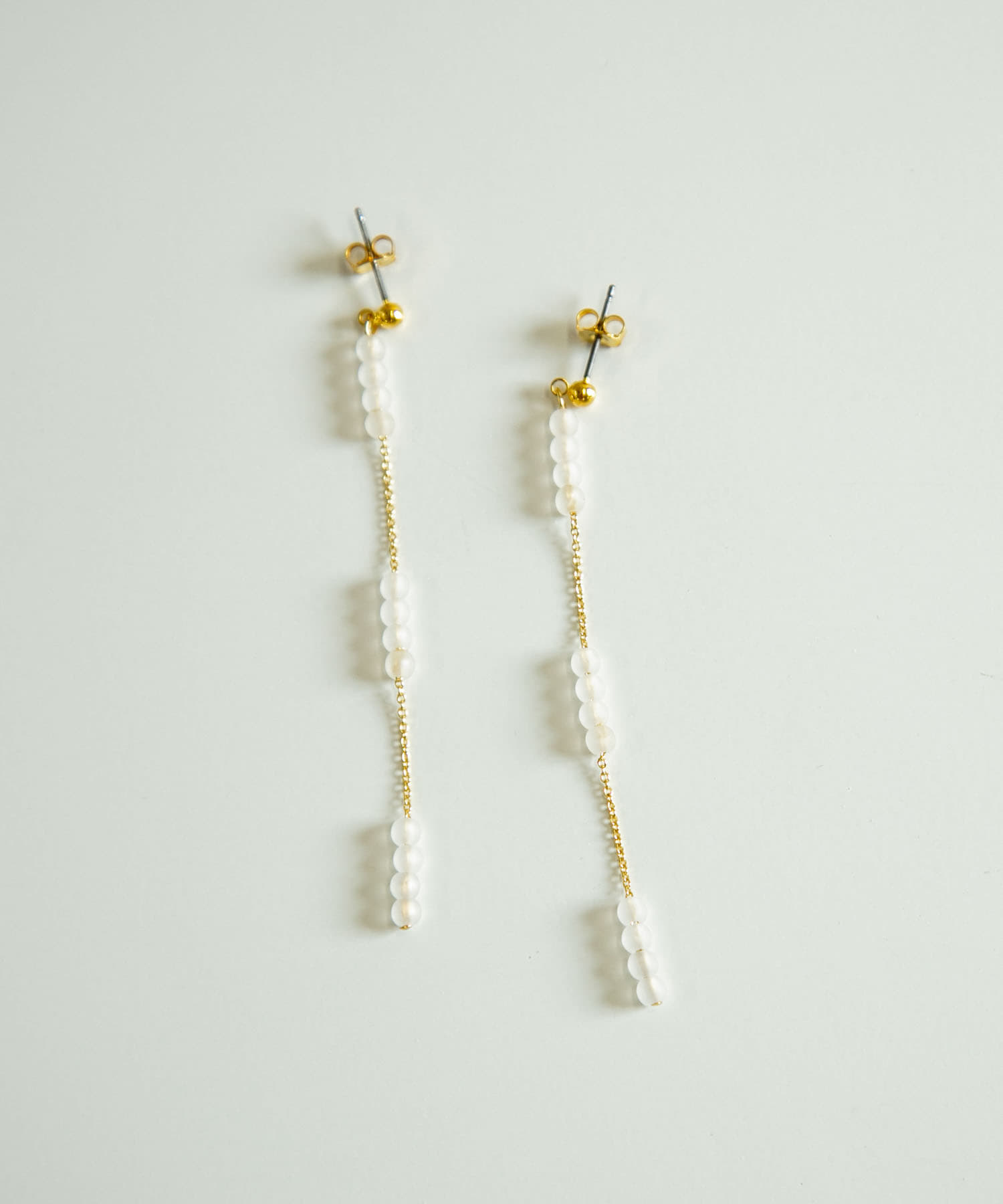 クリアケシチェーンピアス GLD -