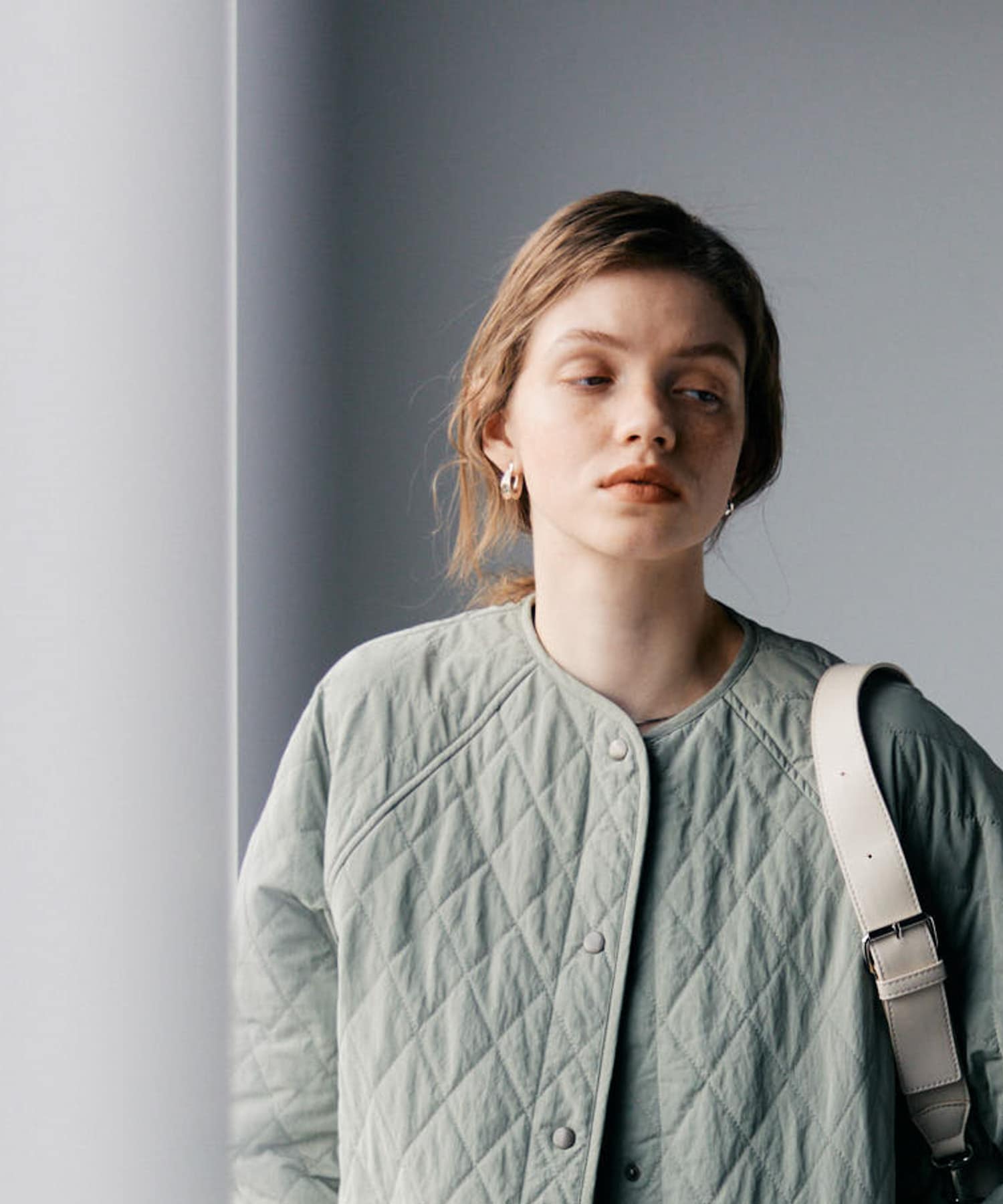 SMELLY so’　curve earring SLV -