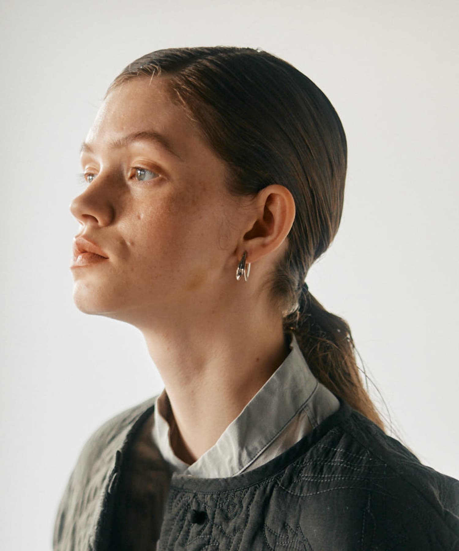 SMELLY so’　curve earring SLV -