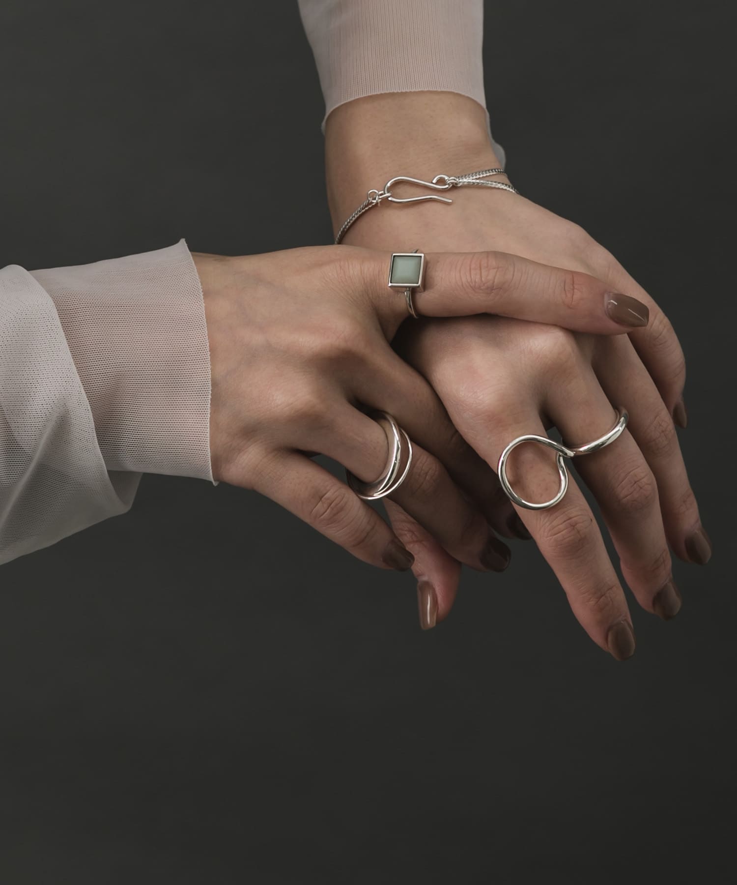 SMELLY so’　double circle ring SLV 11