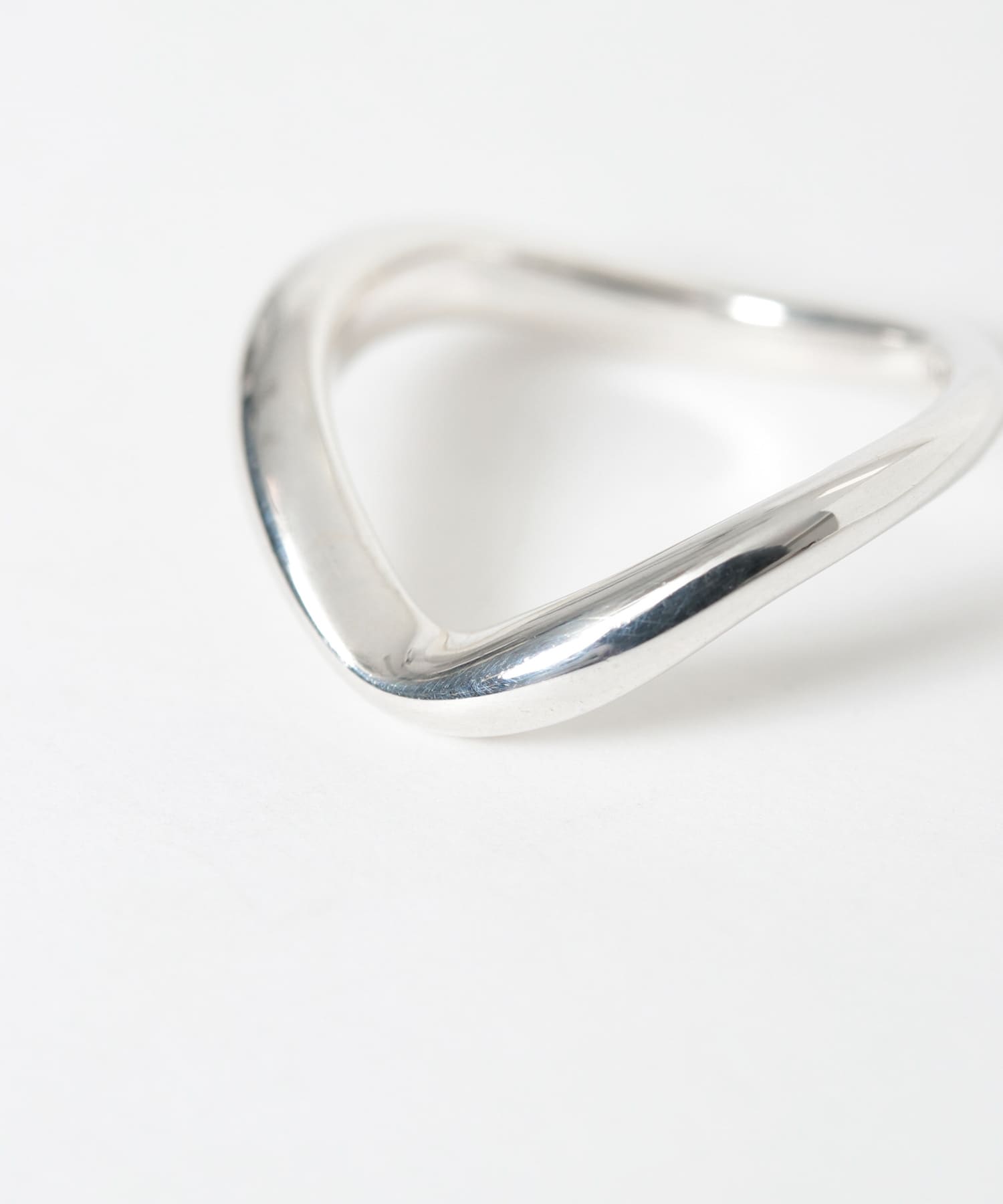 SMELLY so’　curved pinky ring SLV 3