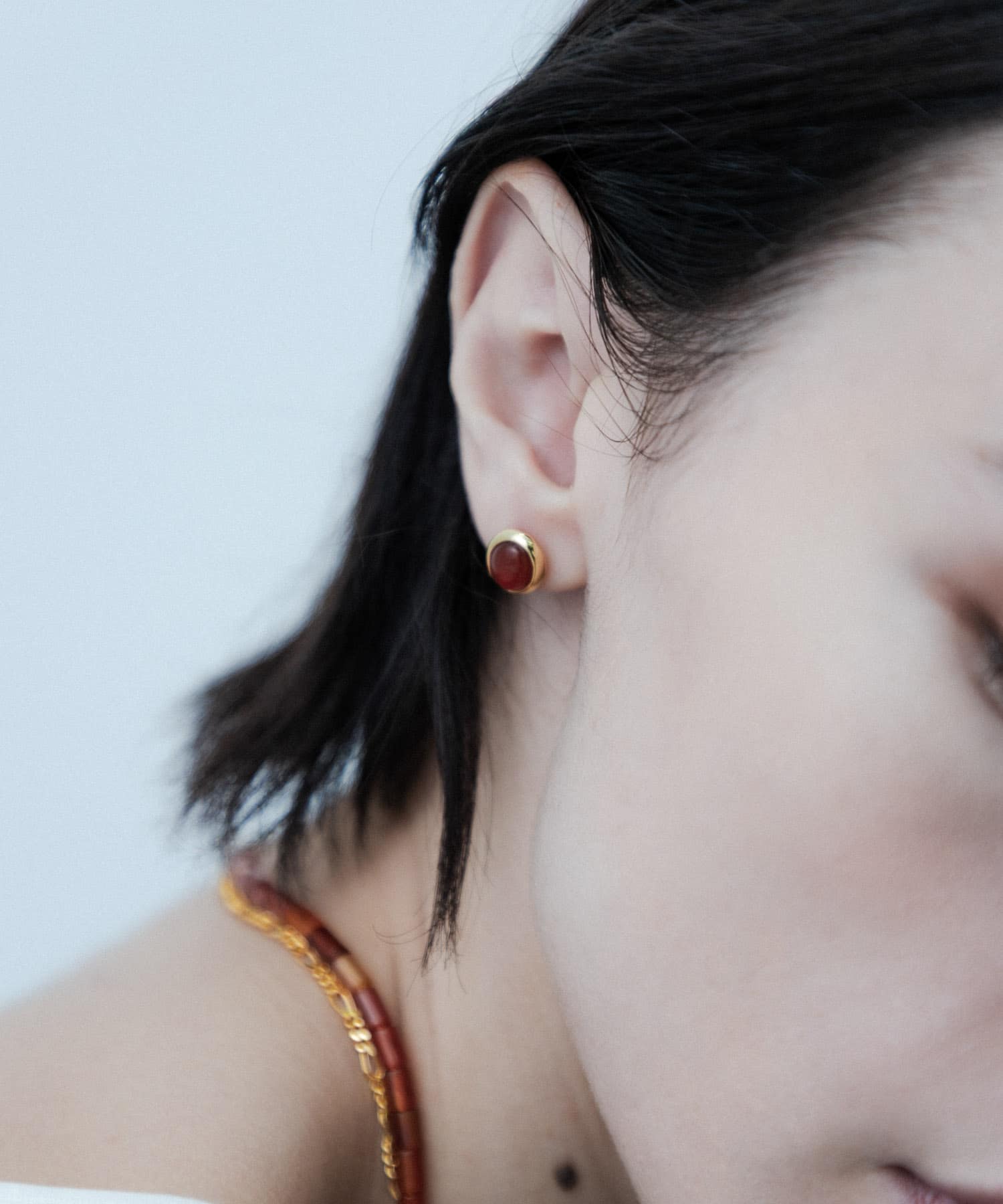 SMELLY so’　carnelian oval pierce GD/RE -