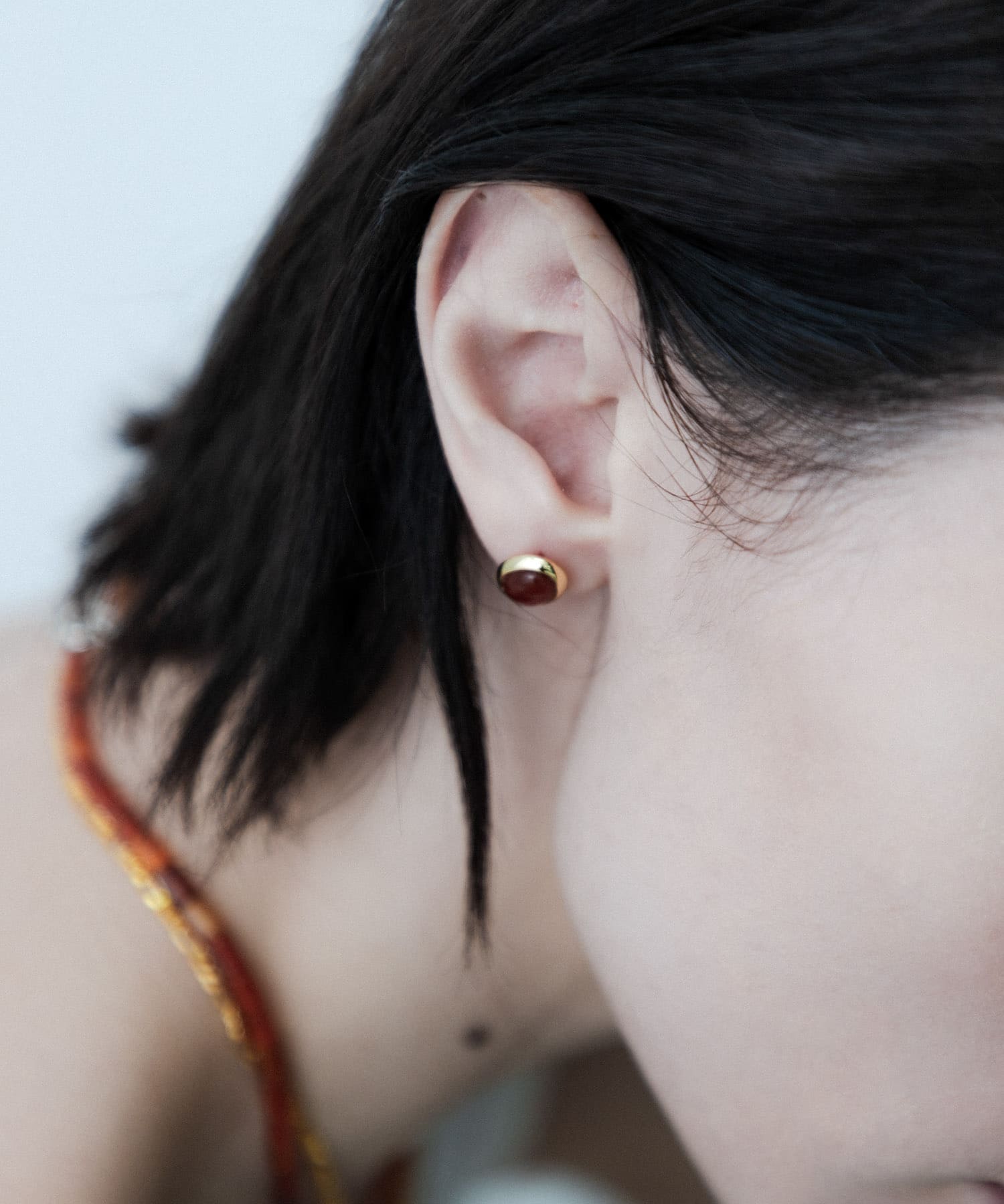 SMELLY so’　carnelian oval pierce GD/RE -