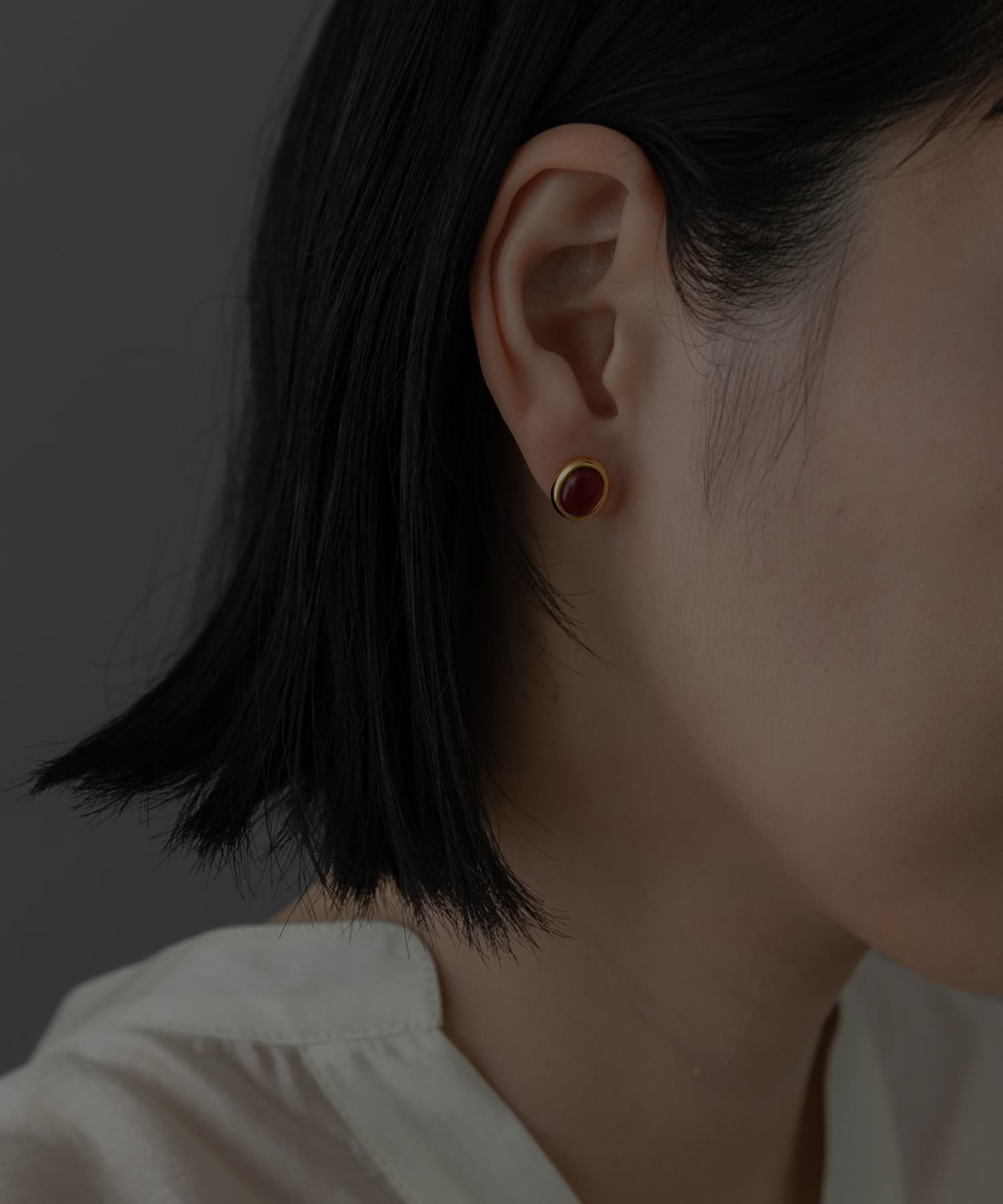 SMELLY so’　carnelian oval pierce GD/RE -