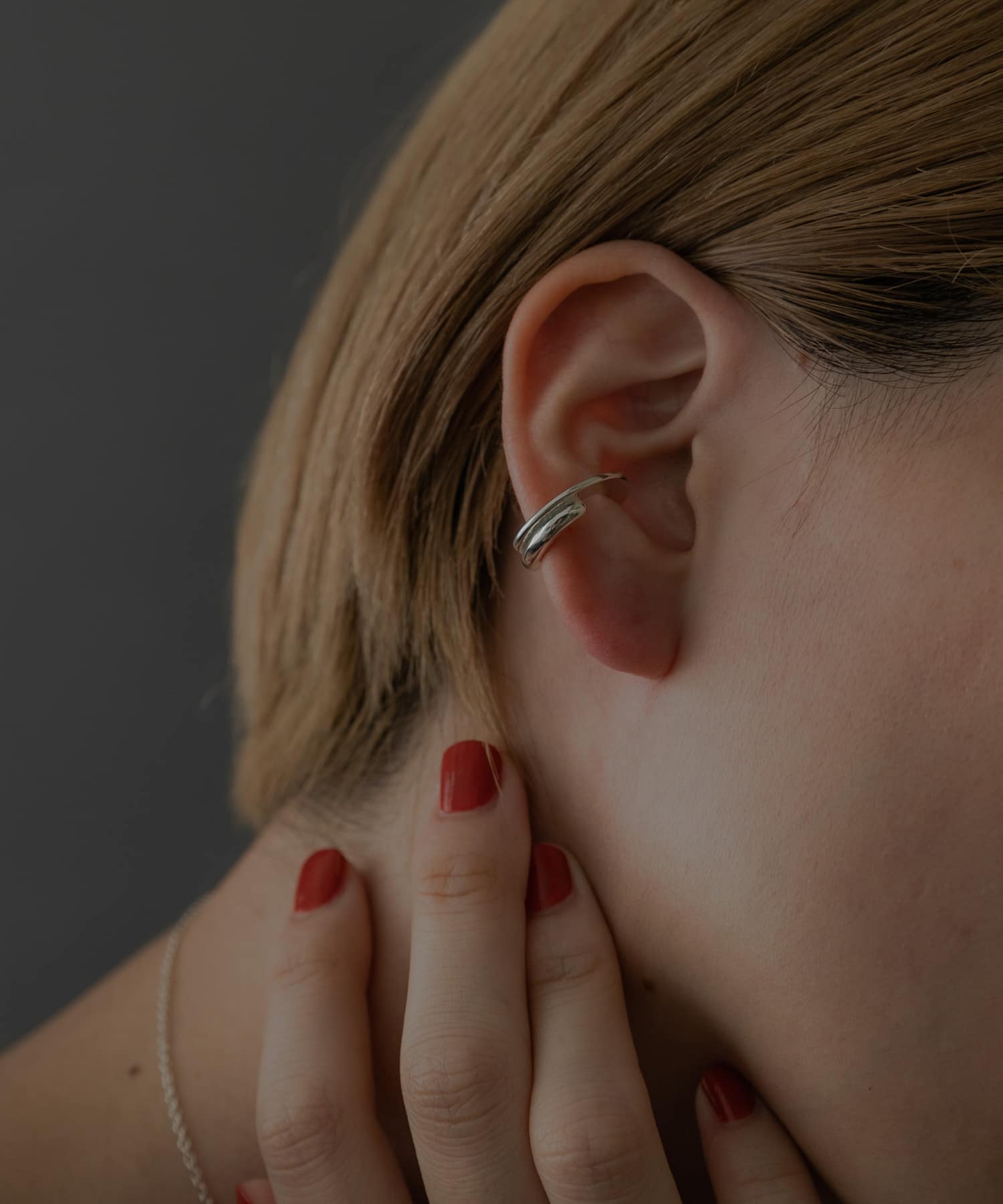 SMELLY so’　overlap circle earcuff SLV -