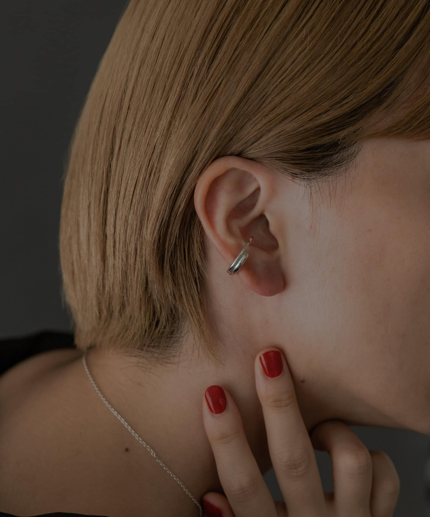 SMELLY so’　overlap circle earcuff SLV -