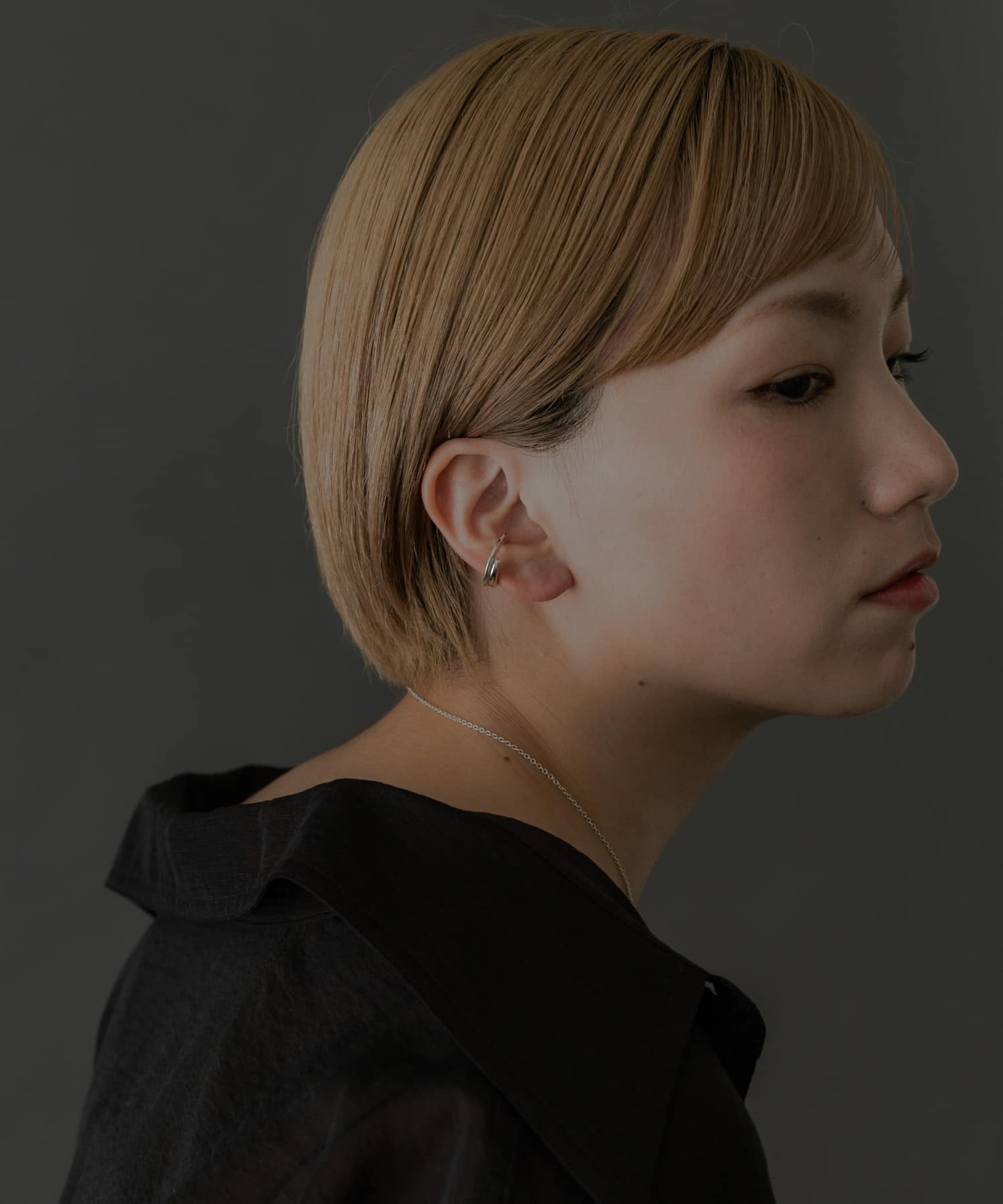 SMELLY so’　overlap circle earcuff SLV -