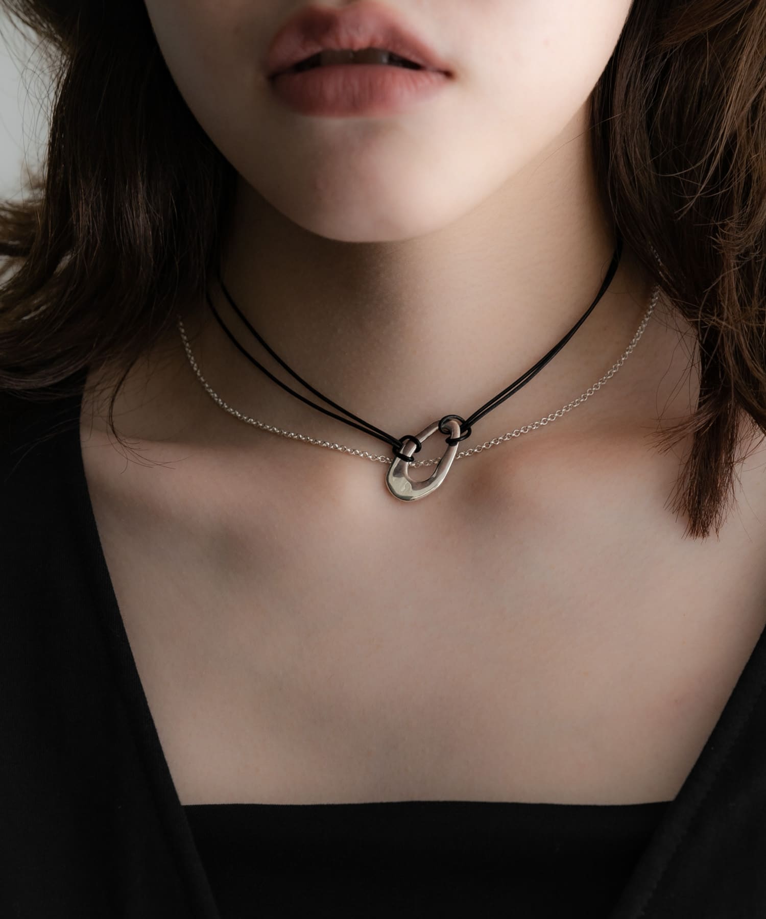 SMELLY so’　oval plate cord necklace SLV -