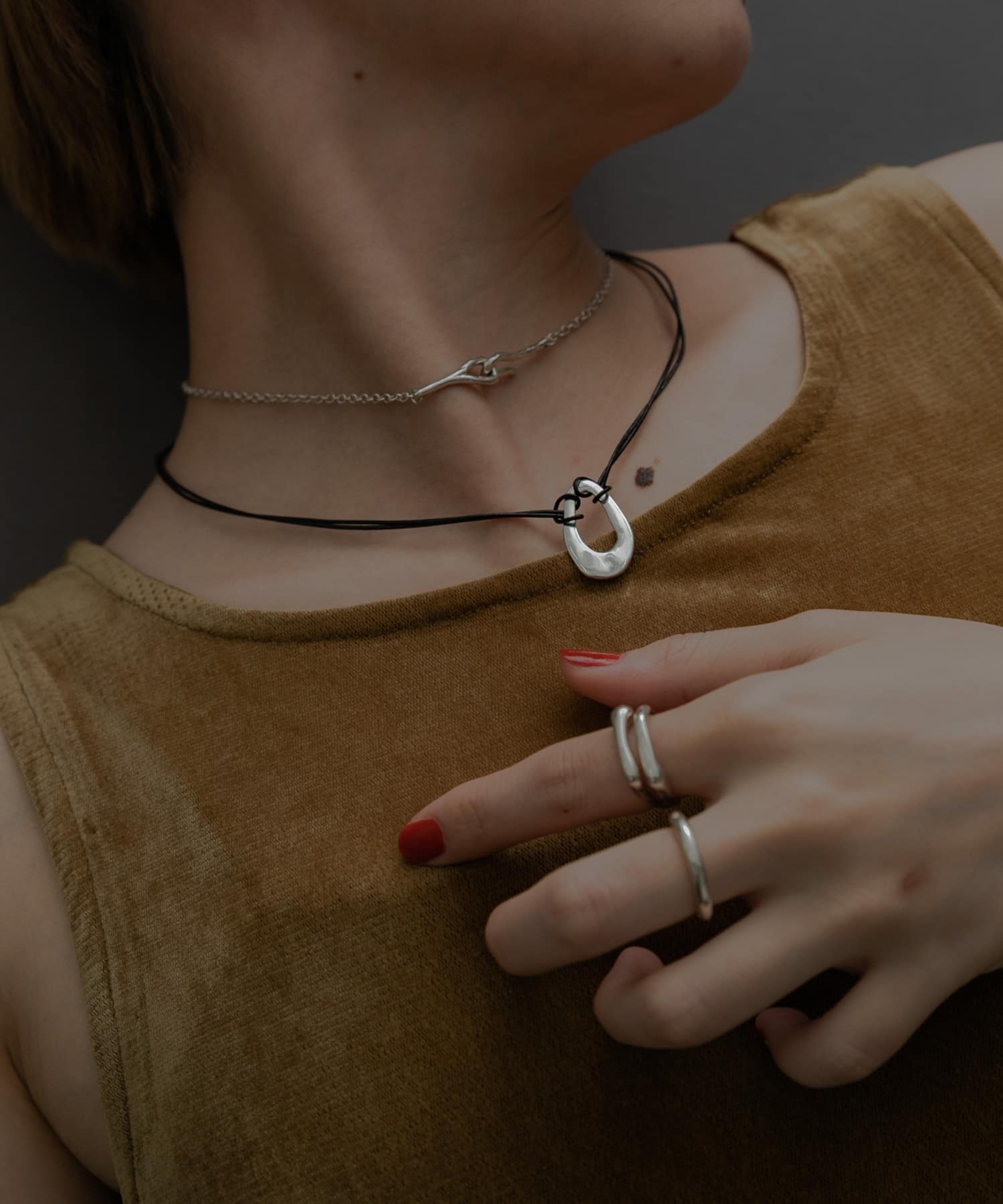 SMELLY so’　oval plate cord necklace SLV -