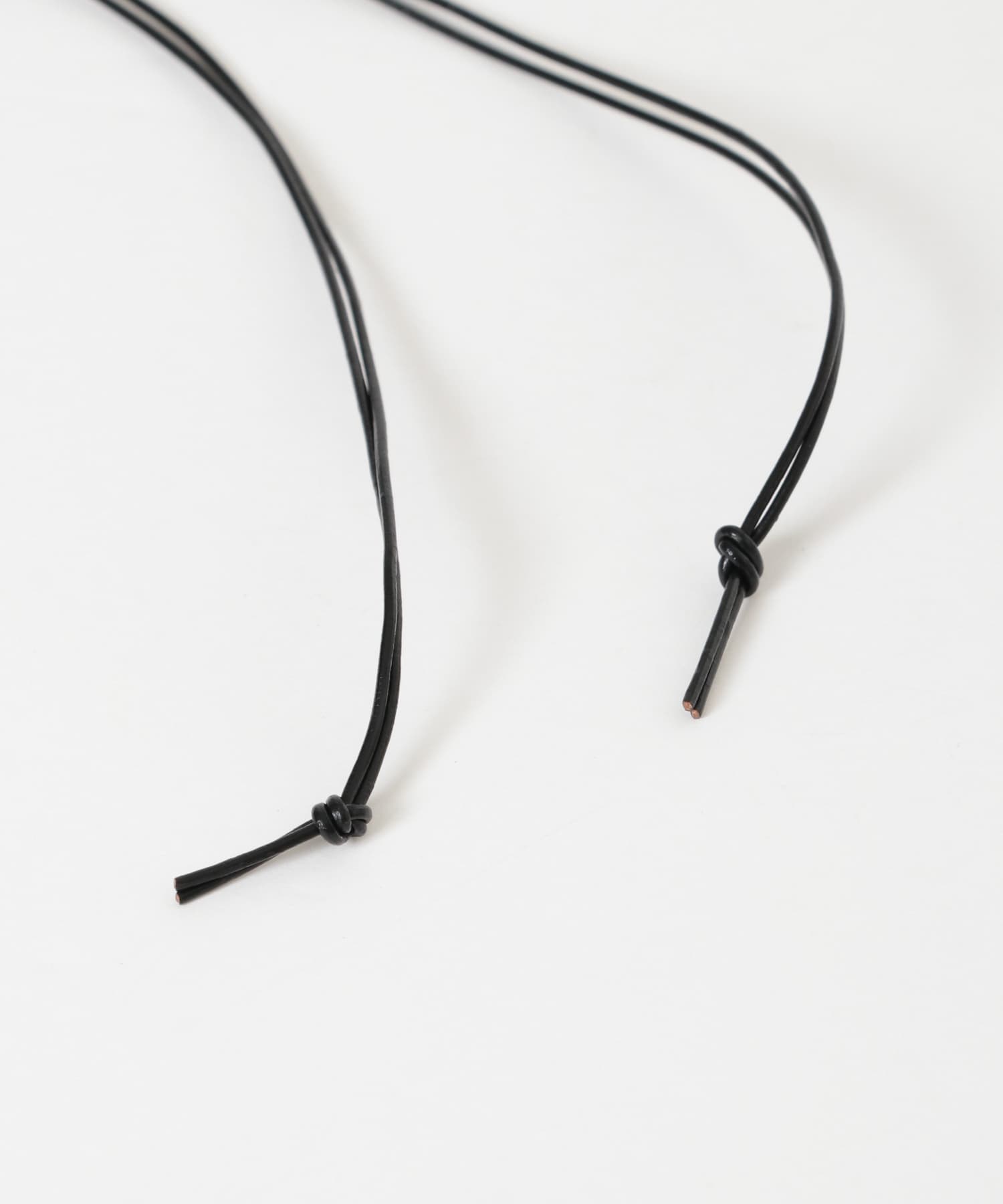 SMELLY so’　oval plate cord necklace SLV -
