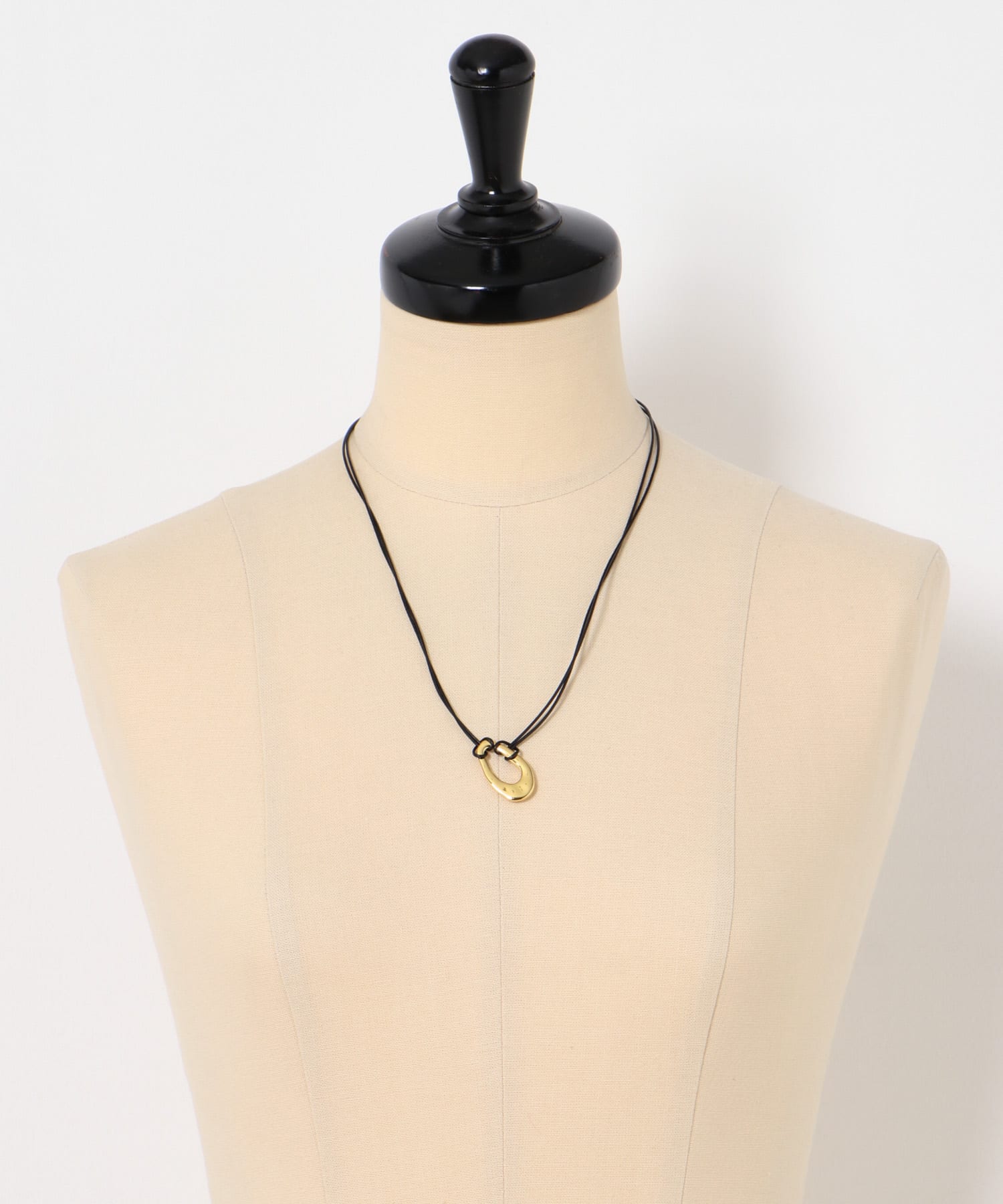SMELLY so’　oval plate cord necklace GLD -