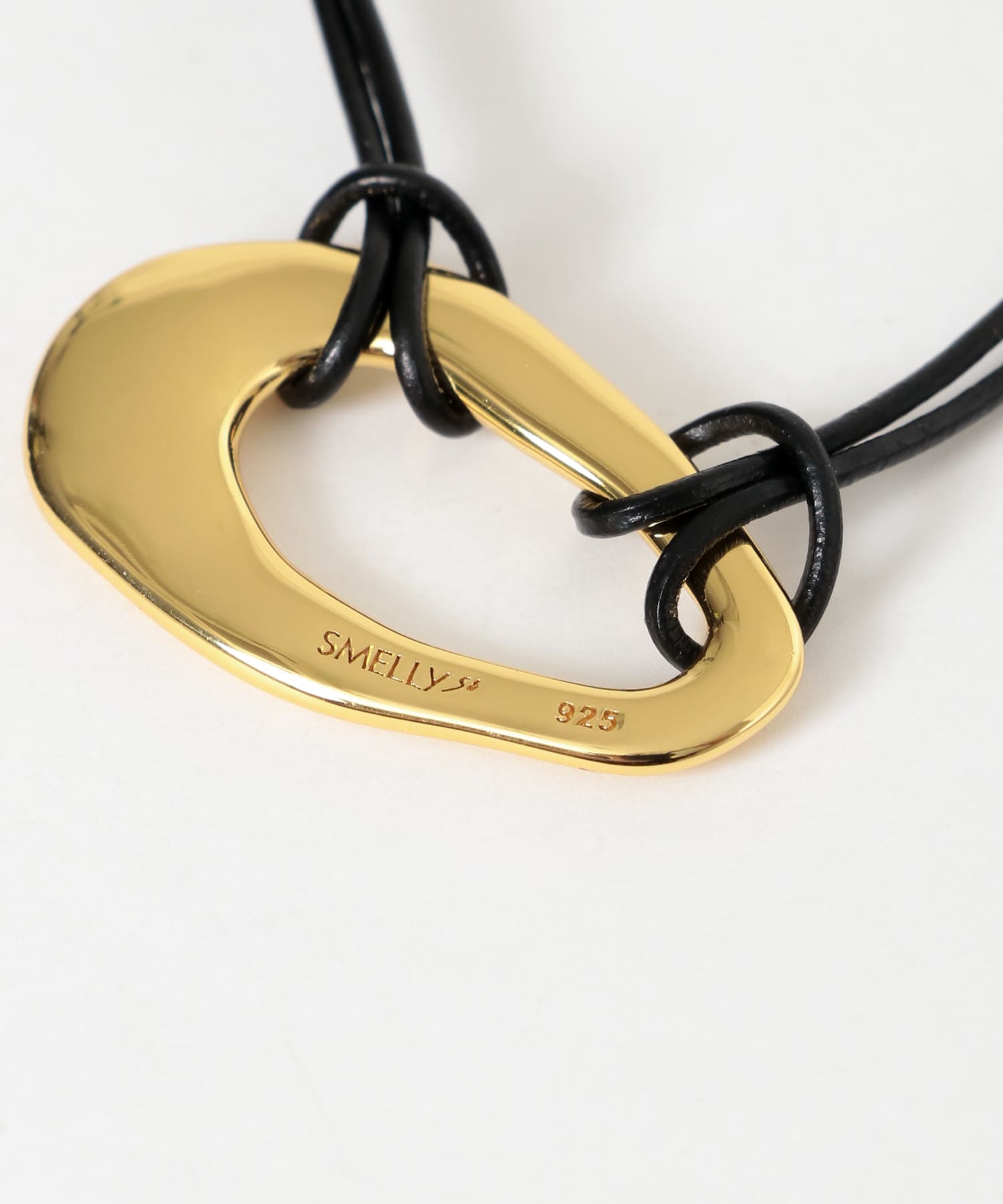 SMELLY so’　oval plate cord necklace GLD -