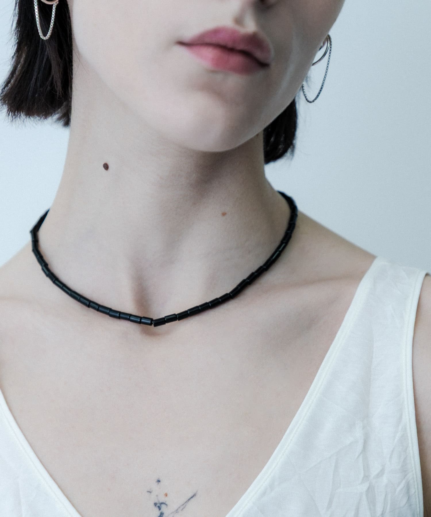 SMELLY so’　onyx mantel necklace BLK -