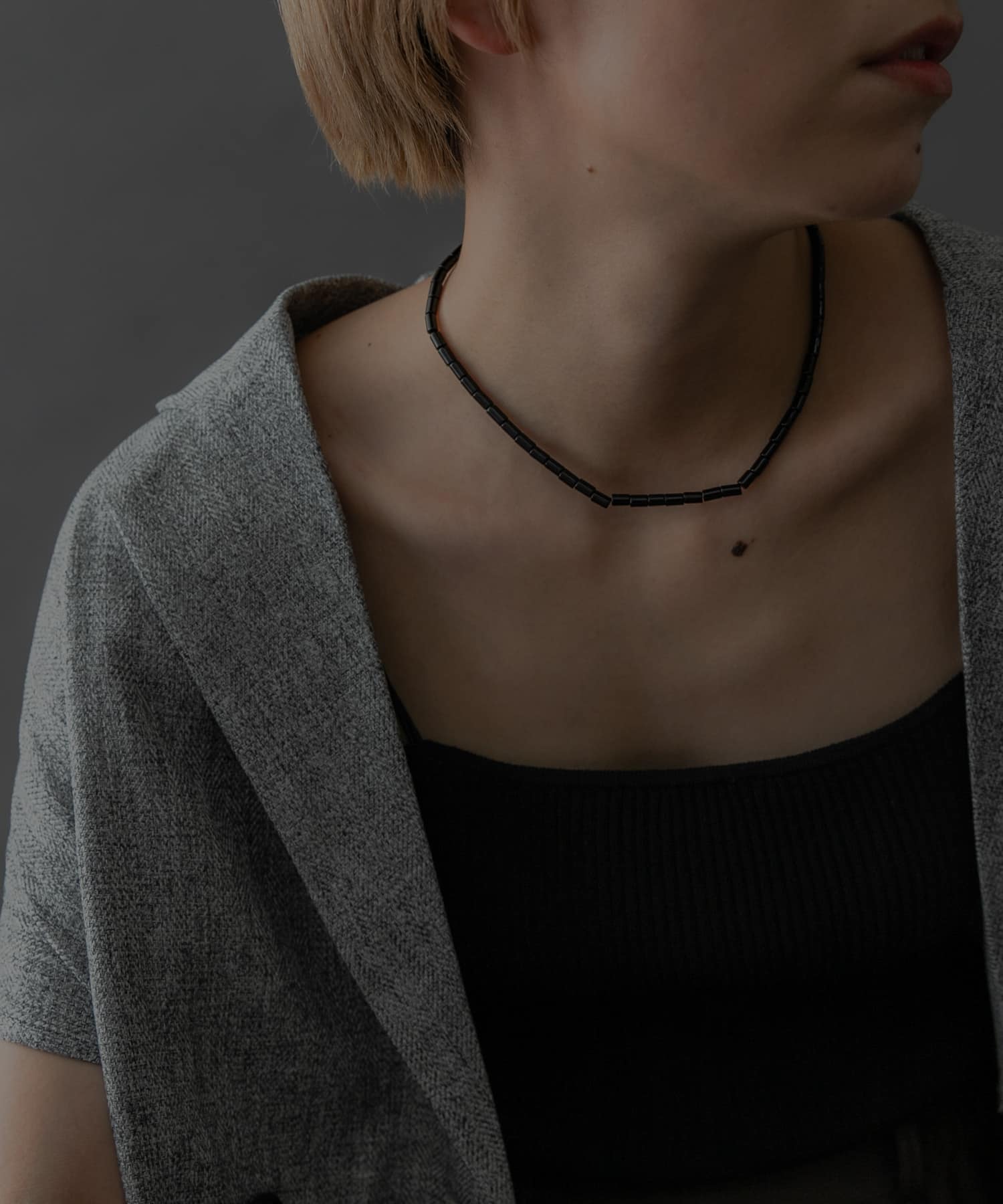 SMELLY so’　onyx mantel necklace BLK -