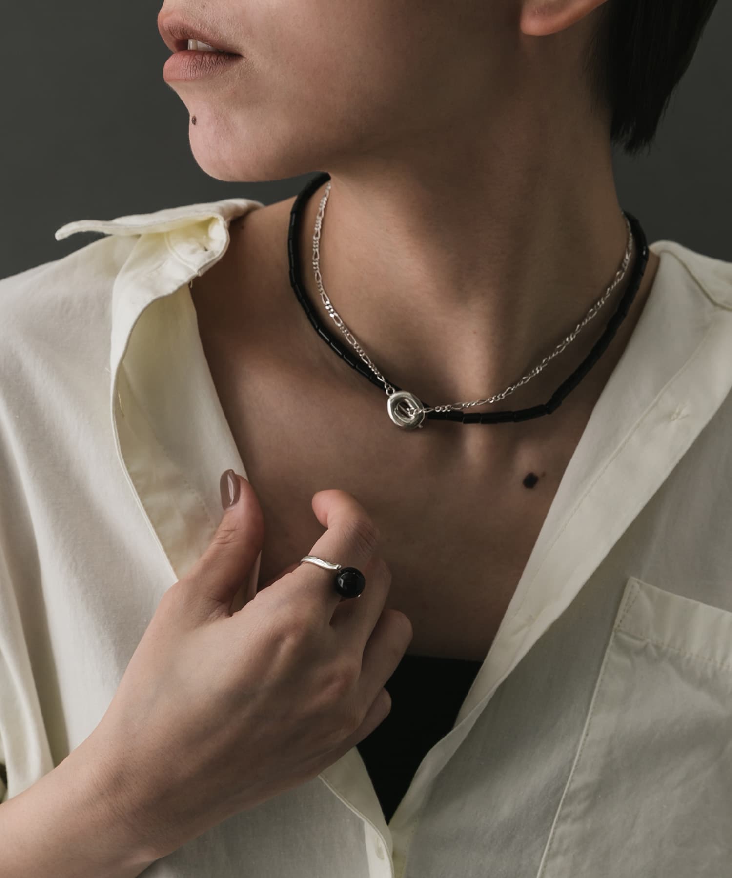 SMELLY so’　onyx mantel necklace BLK -