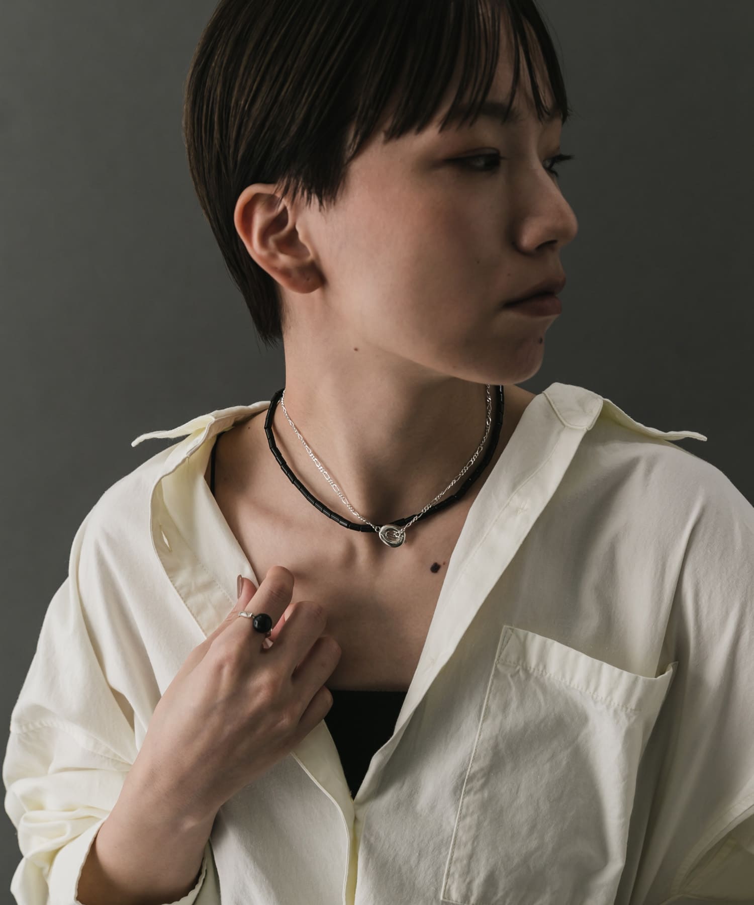 SMELLY so’　onyx mantel necklace BLK -