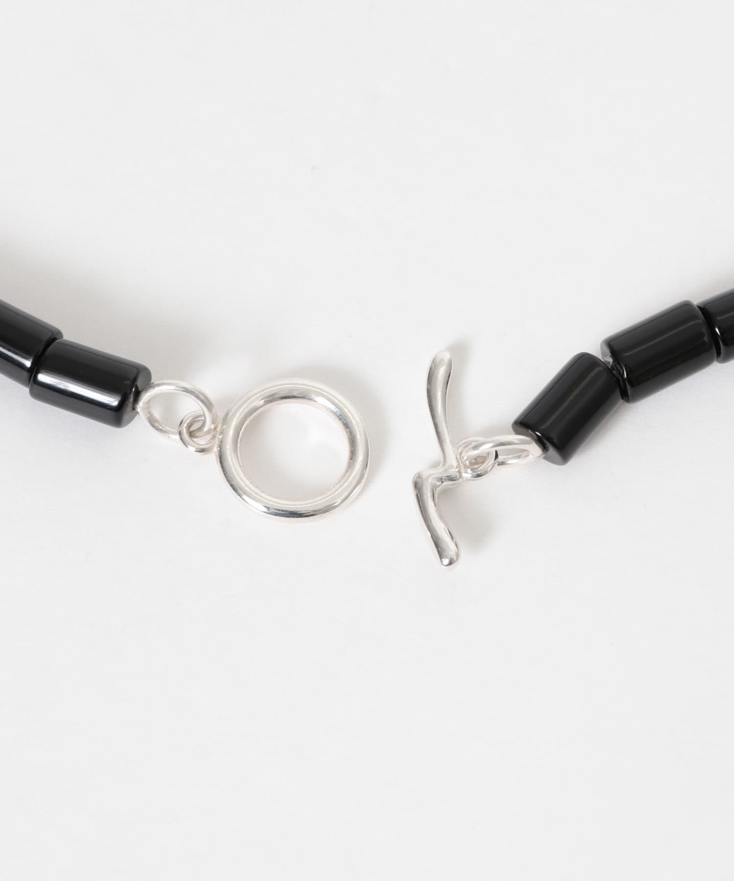 SMELLY so’　onyx mantel necklace BLK -