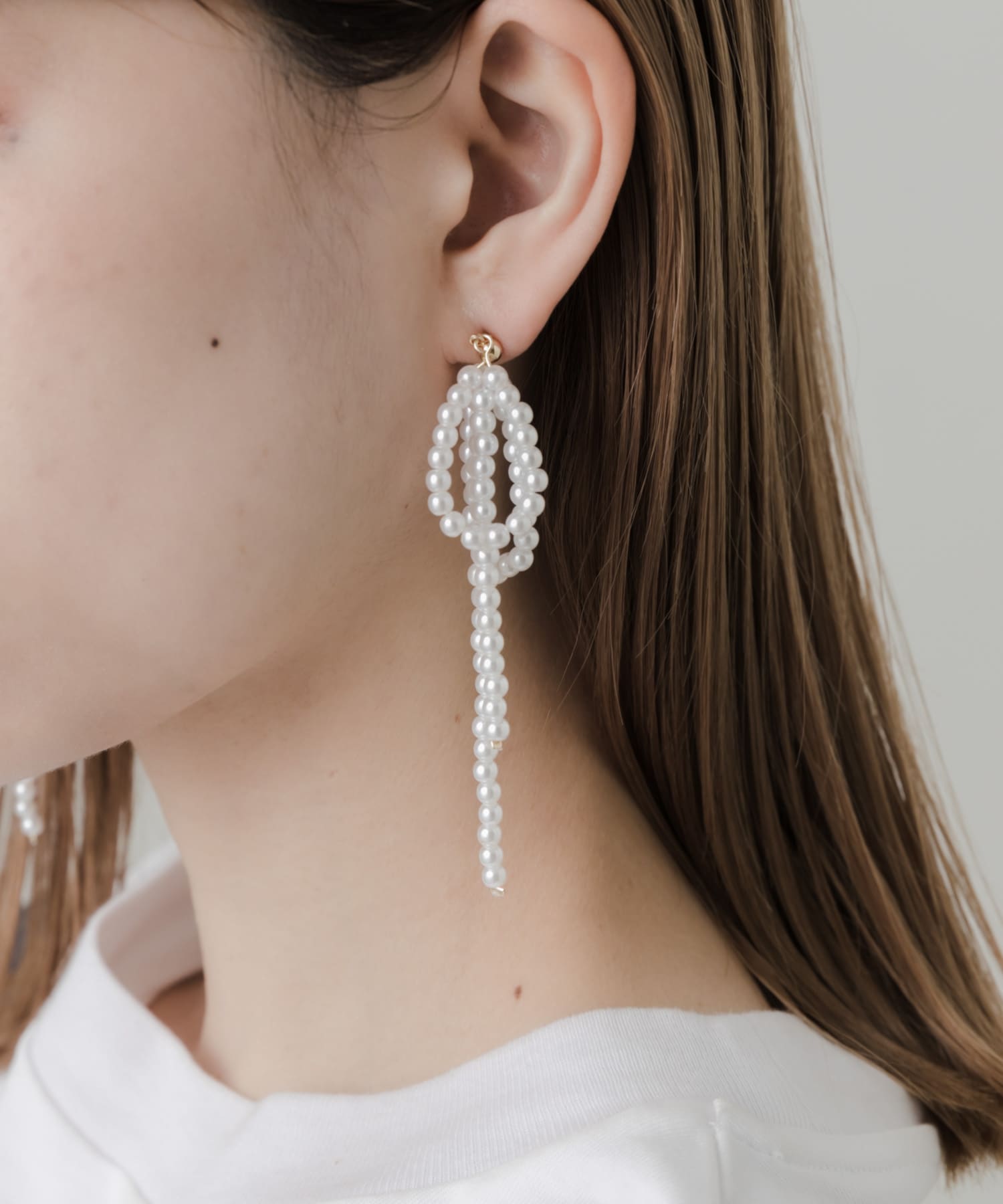パールビッグリボンピアス IVO -