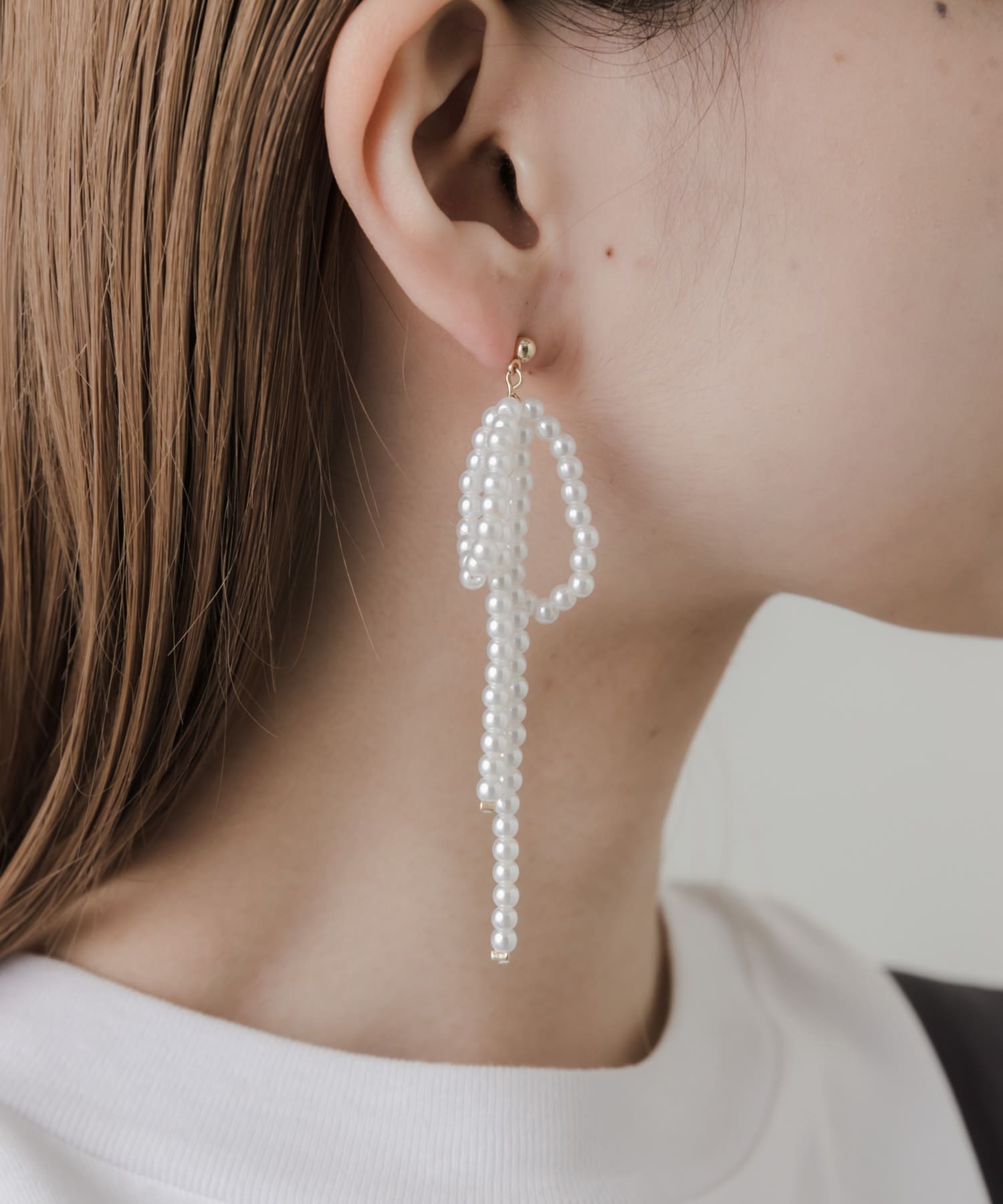 パールビッグリボンピアス IVO -