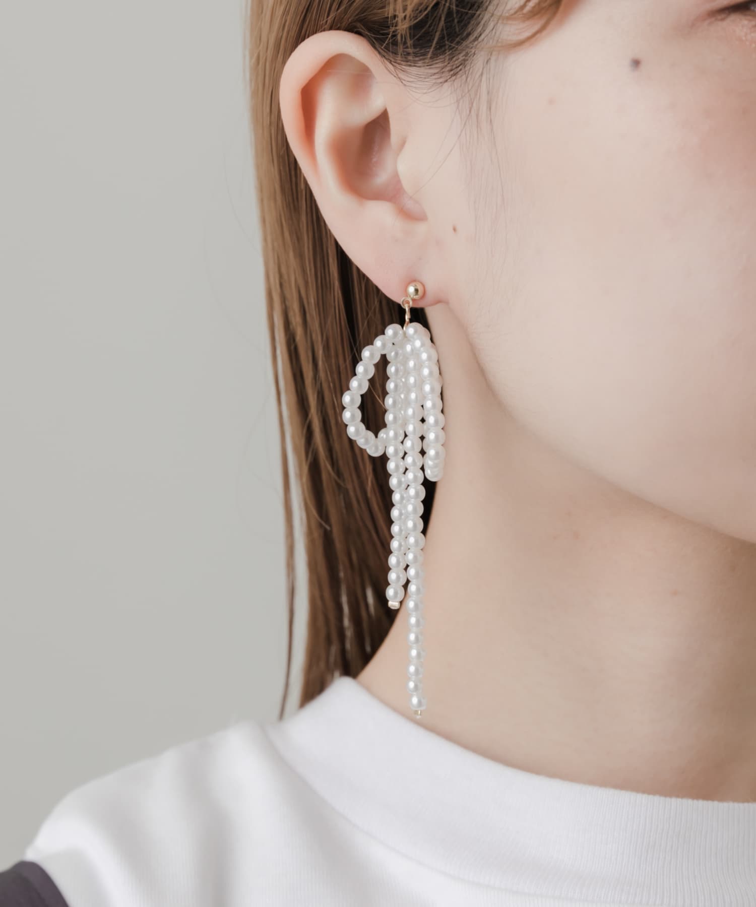 パールビッグリボンピアス IVO -