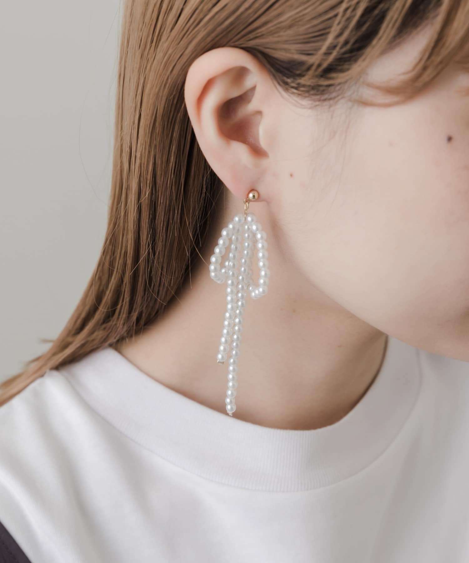 パールビッグリボンピアス IVO -