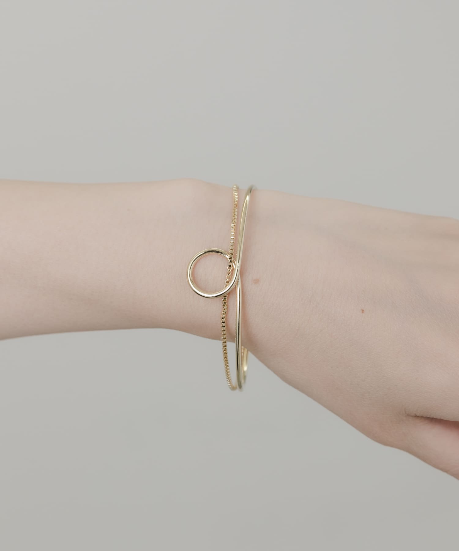 ニュアンスカーブバングル GLD -