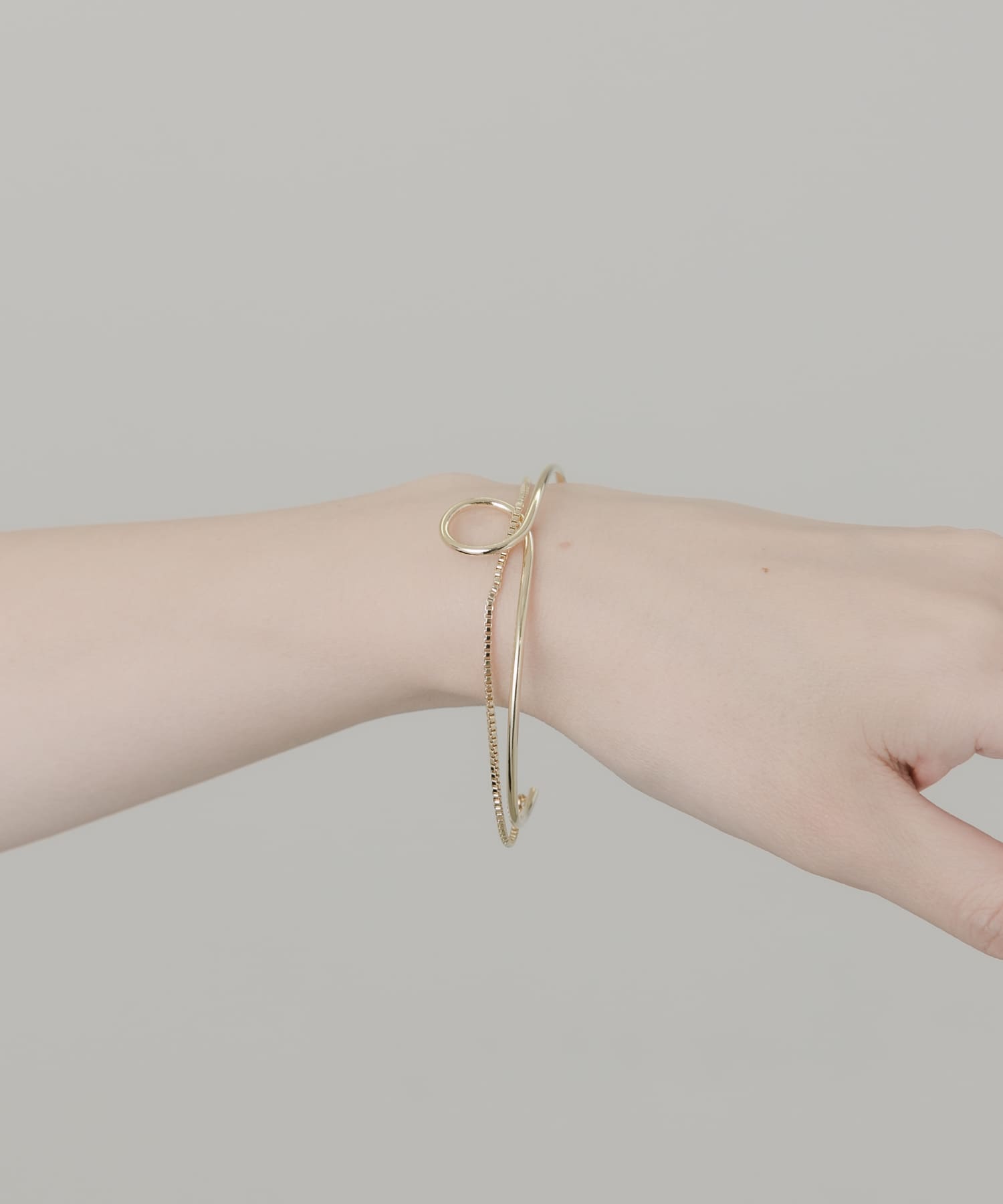 ニュアンスカーブバングル GLD -