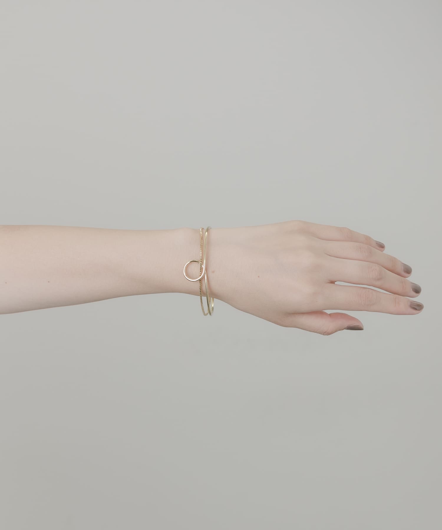 ニュアンスカーブバングル GLD -