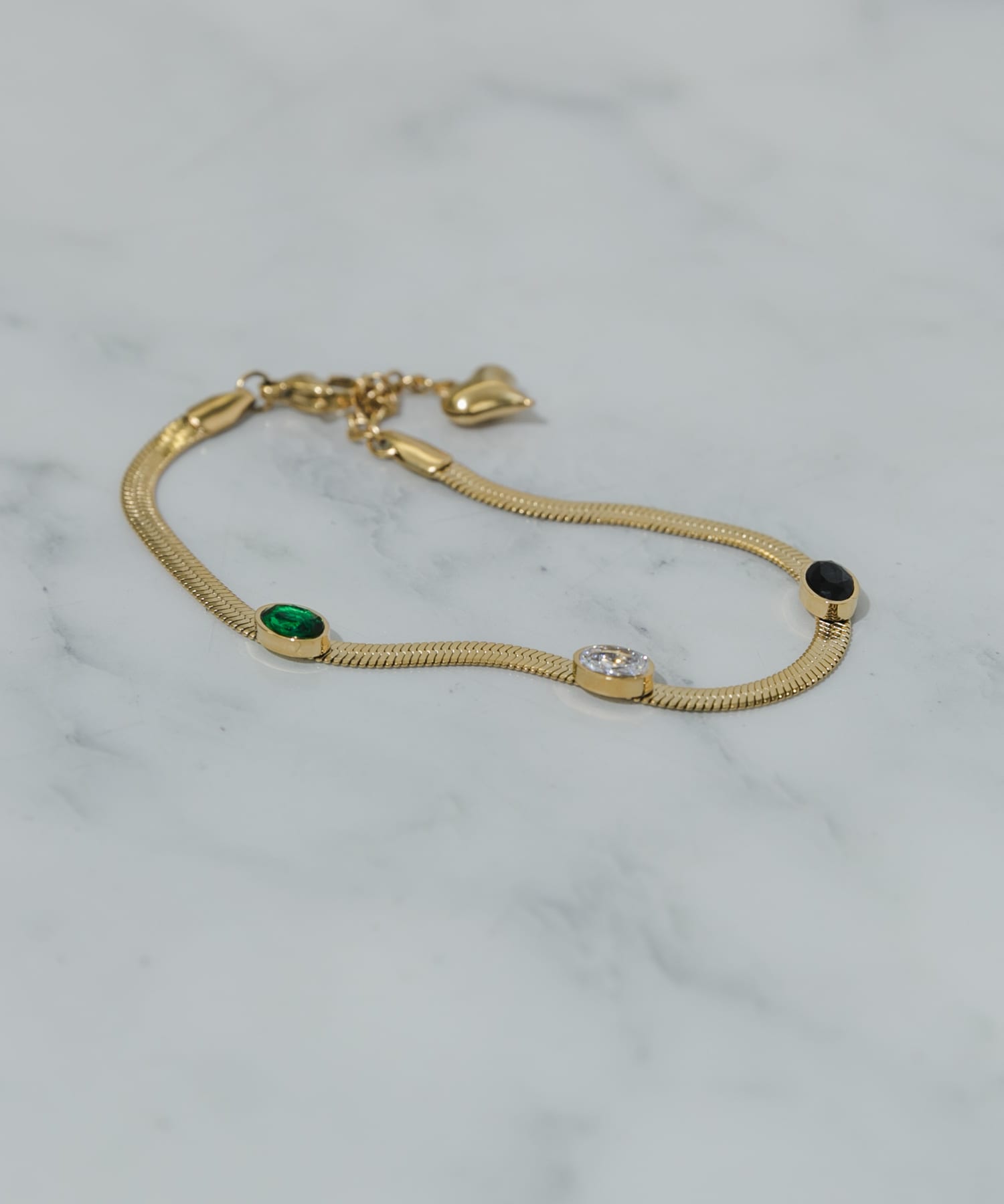 ステンレスストーンスネークブレスレット GLD -