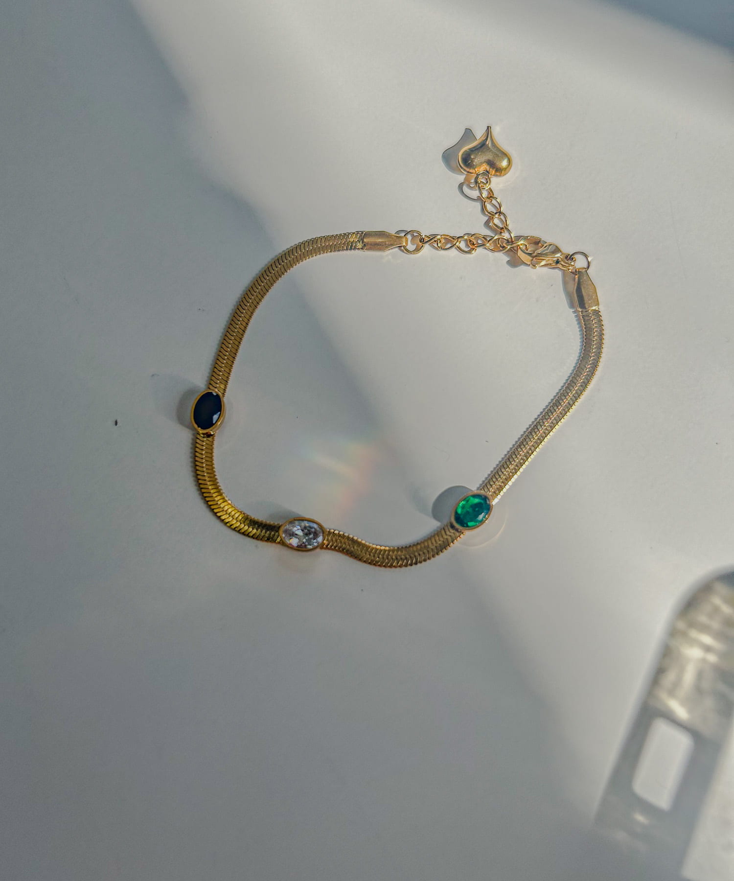 ステンレスストーンスネークブレスレット GLD -