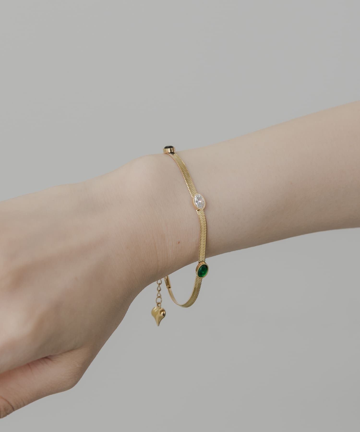 ステンレスストーンスネークブレスレット GLD -