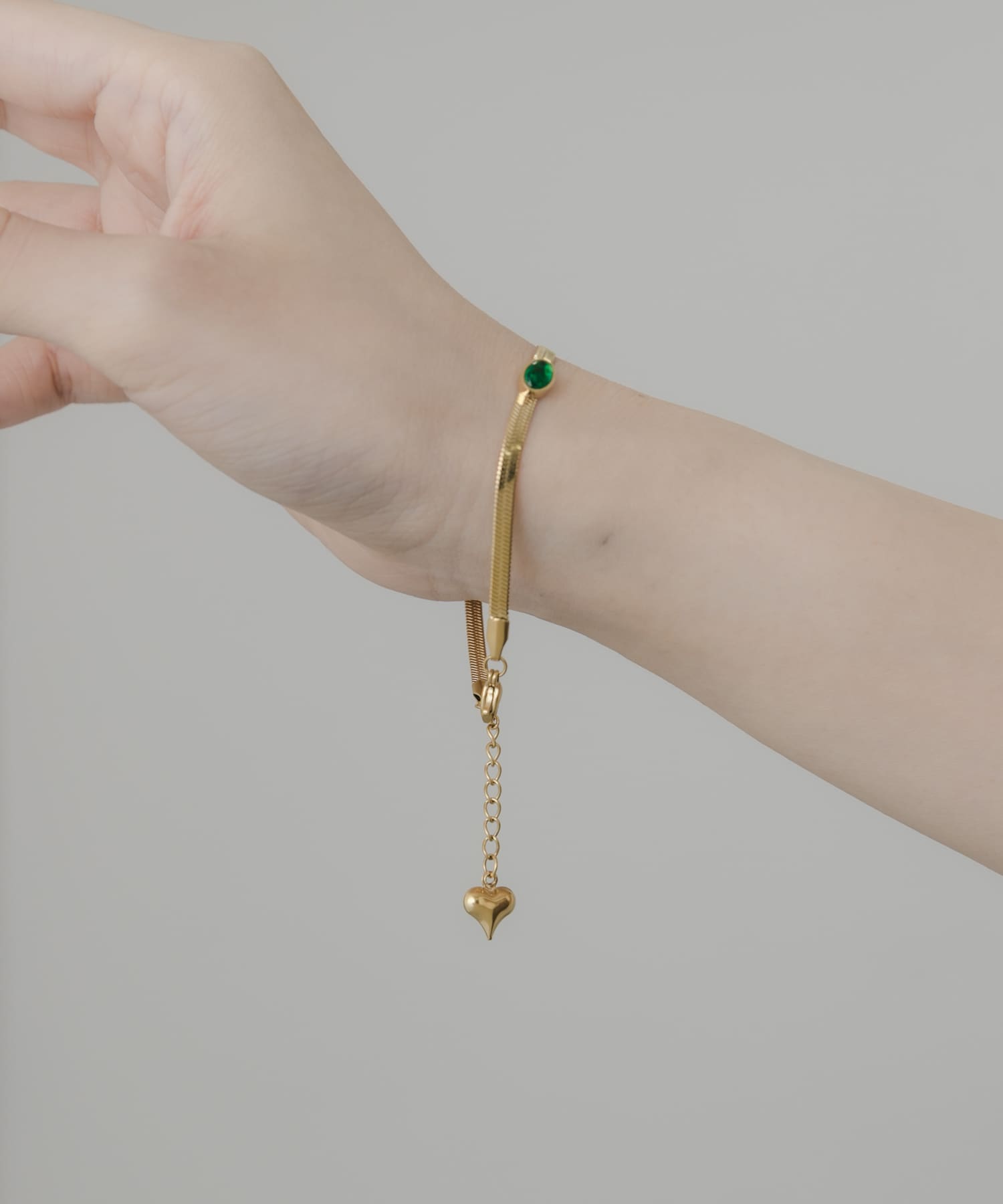 ステンレスストーンスネークブレスレット GLD -
