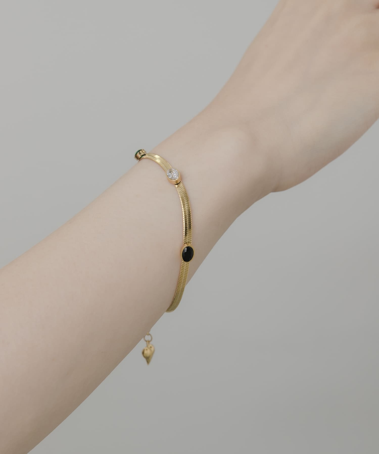 ステンレスストーンスネークブレスレット GLD -