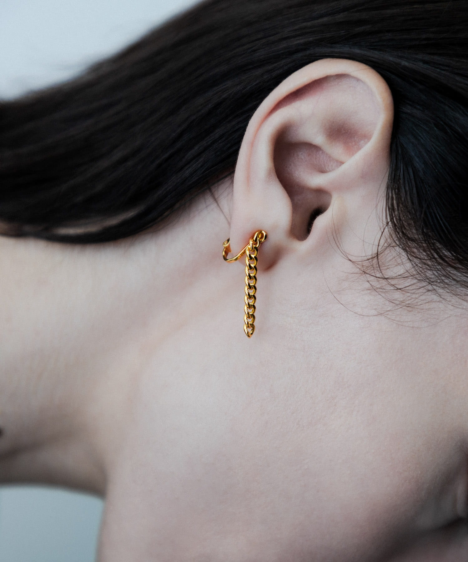 SMELLY so’　asymmetry chain earring GLD -