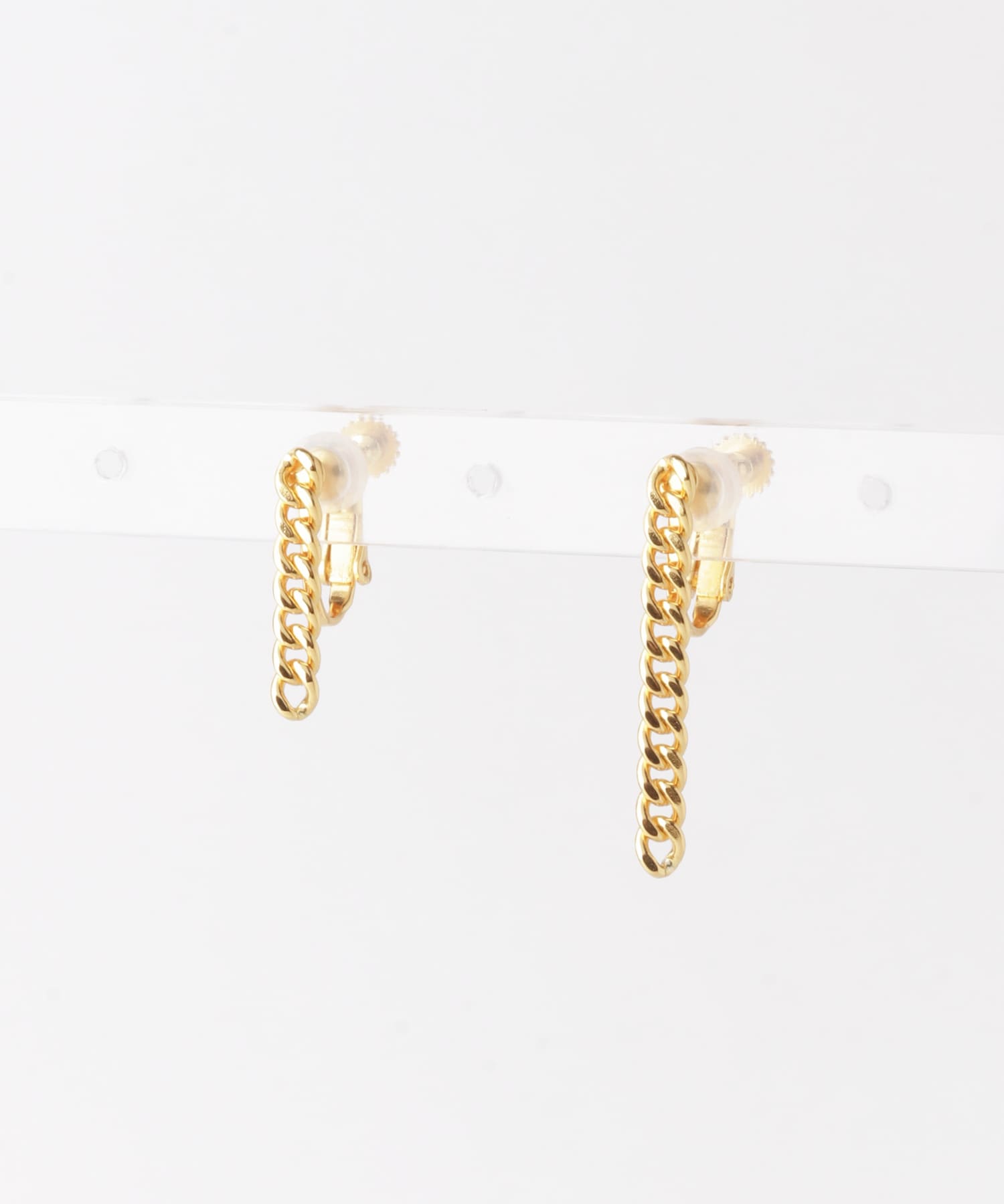SMELLY so’　asymmetry chain earring GLD -