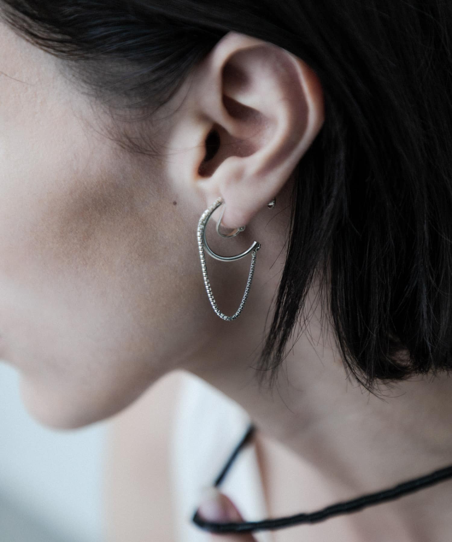 SMELLY so’　combination chain earring SLV -
